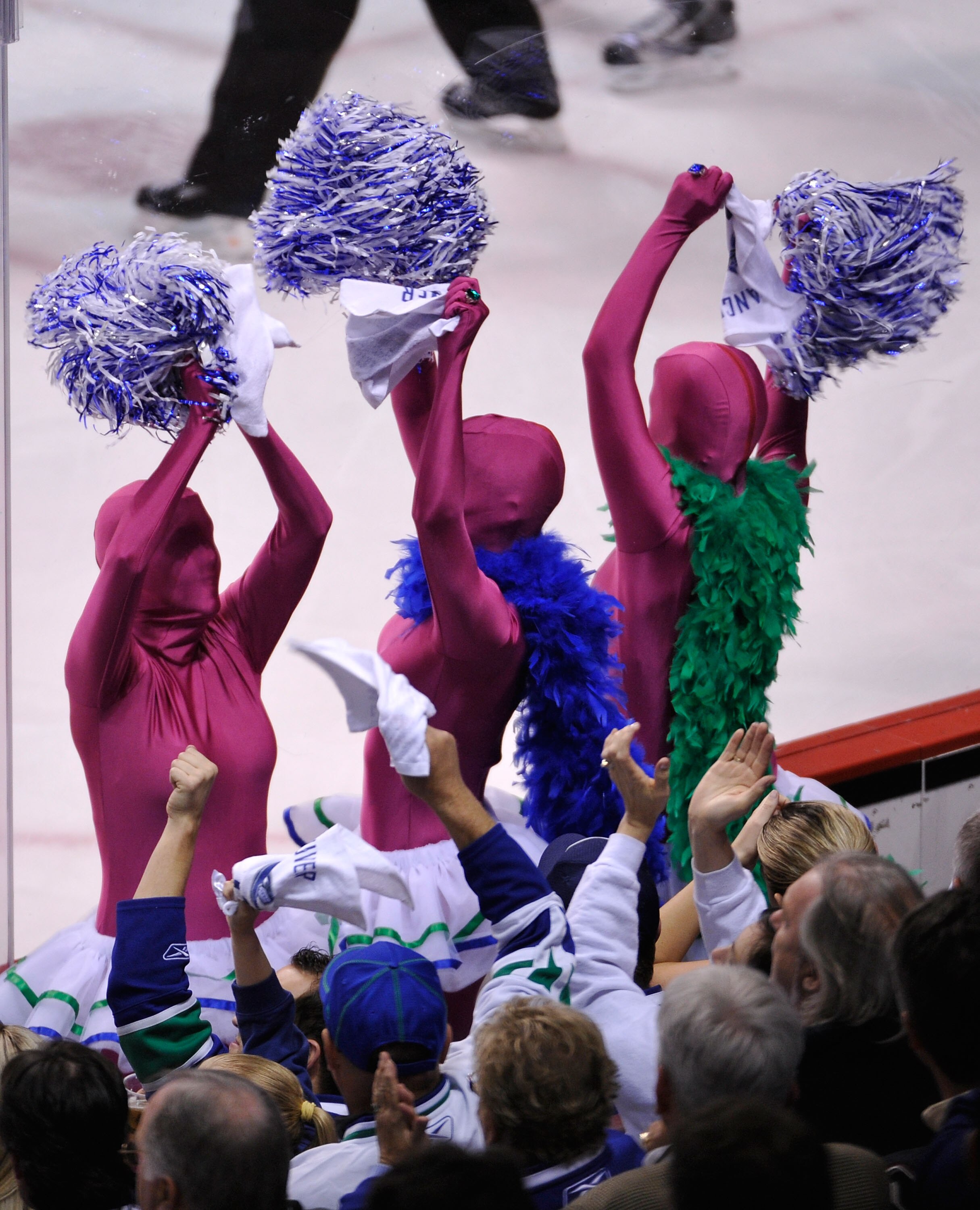 VANCOUVER, CANADA - MAY 24:  Vancouver Canucks fans show their support in Game Five of the Western Conference Finals between the San Jose Sharks and the Vancouver Canucks during the 2011 Stanley Cup Playoffs at Rogers Arena on May 24, 2011 in Vancouver, B