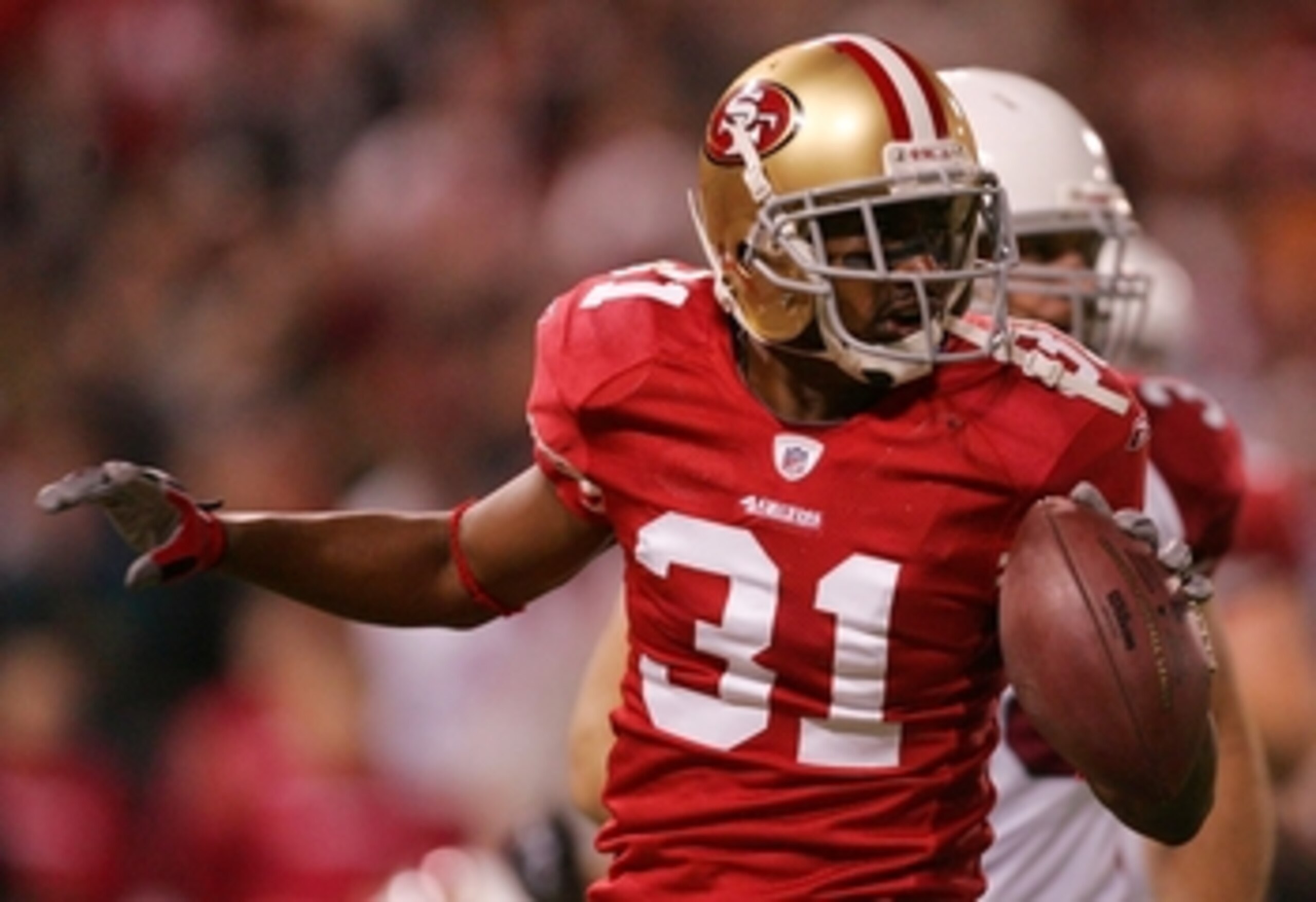 SAN FRANCISCO - DECEMBER 14: Cornerback Dre' Bly #31 of the San Francisco 49ers celebrates after recovering a fumble by the Arizona Cardinals at Candlestick Park on December 14, 2009 in San Francisco, California. (Photo by Ezra Shaw/Getty Images)