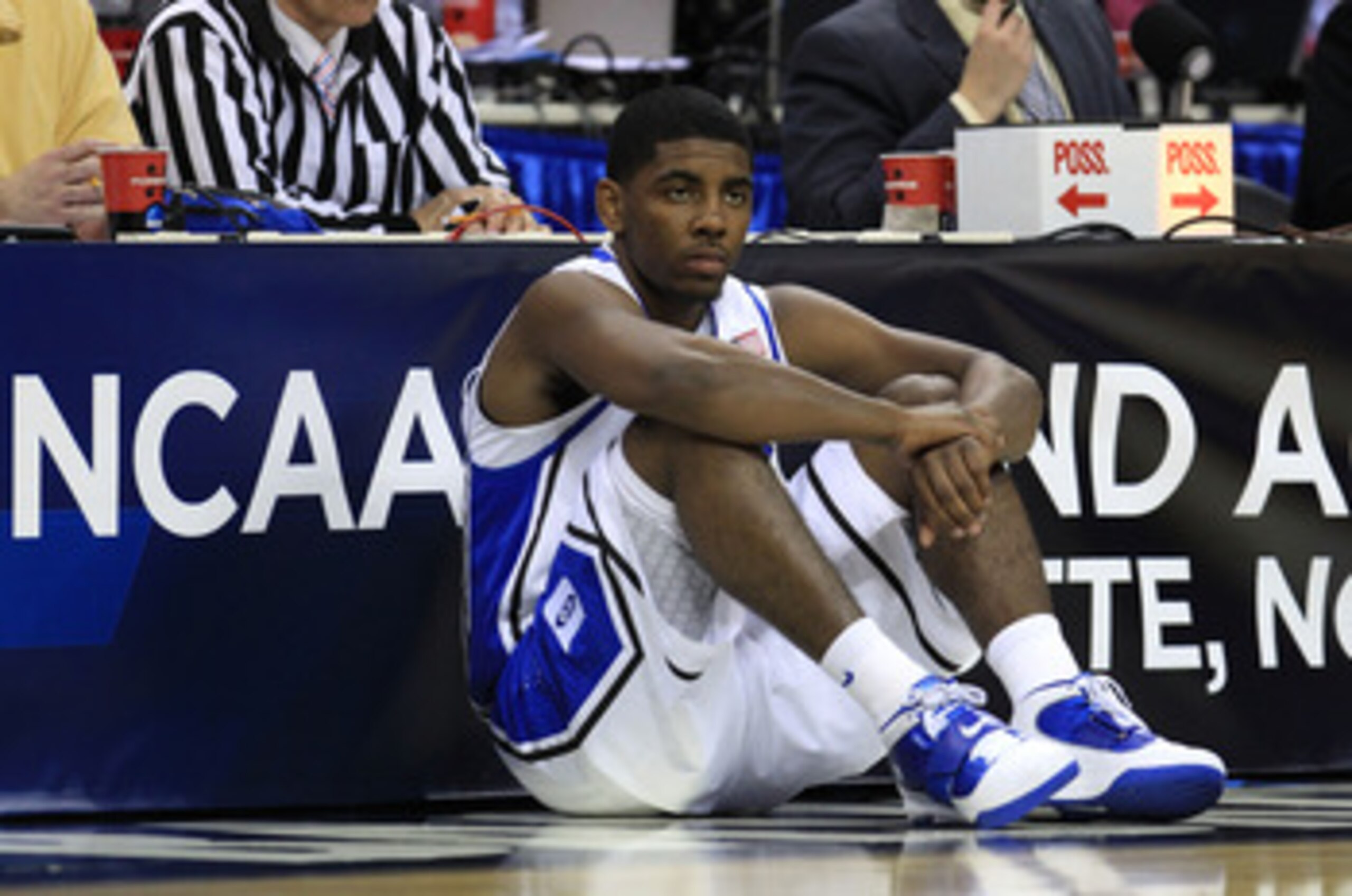 CHARLOTTE, NC - MARCH 20: Kyrie Irving #1 of the Duke Blue Devils waits to enter the game while taking on the Michigan Wolverines during the third round of the 2011 NCAA men's basketball tournament at Time Warner Cable Arena on March 20, 2011 in Charlott CHARLOTTE, NC - MARCH 20: Kyrie Irving #1 of the Duke Blue Devils waits to enter the game while taking on the Michigan Wolverines during the third round of the 2011 NCAA men's basketball tournament at Time Warner Cable Arena on March 20, 2011 in Charlott