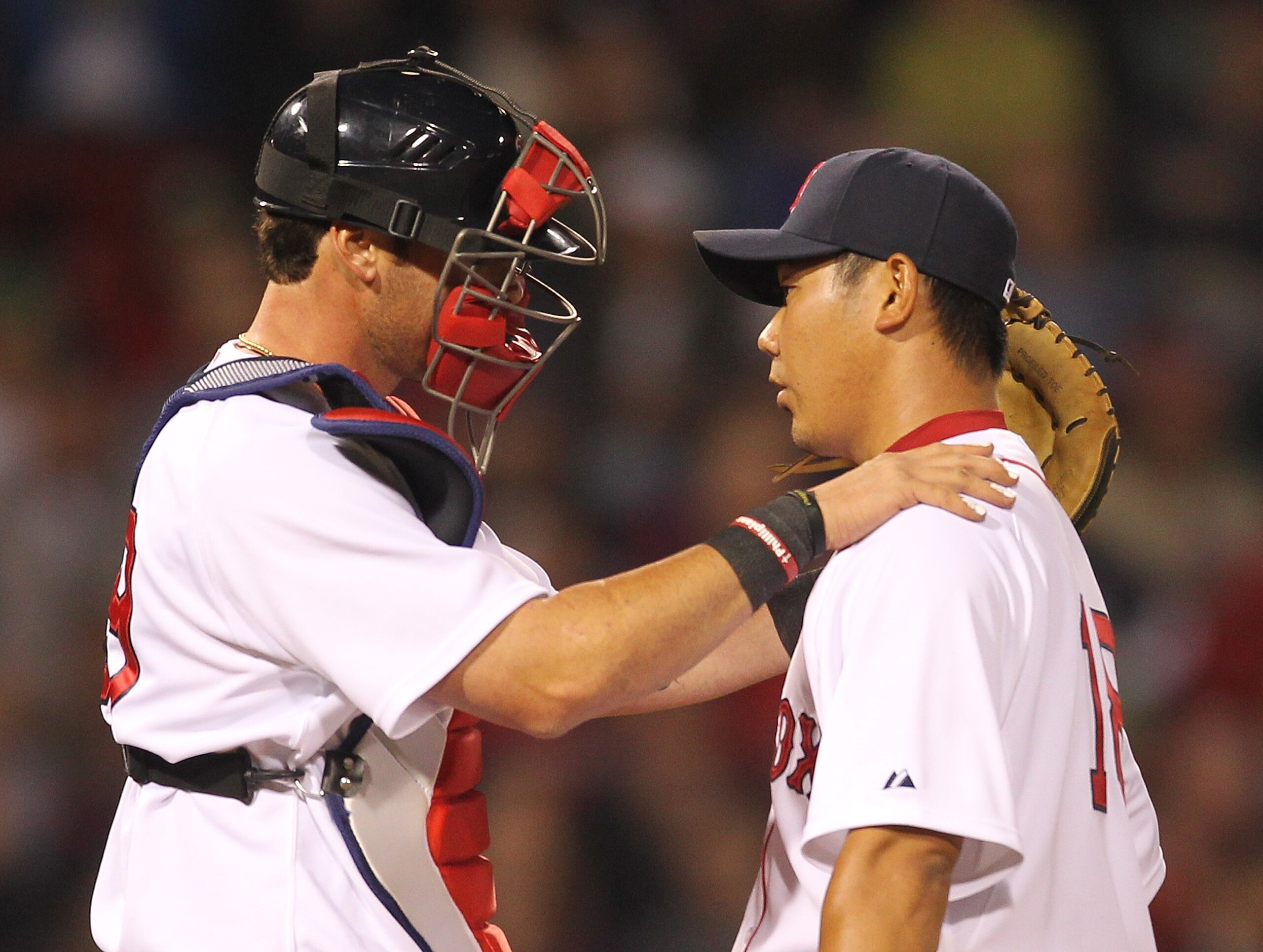 BOSTON, MA - APRIL 11: Jarrod Saltalamacchia #39 consoles Daisuke Matsuzaka #18 of the Boston Red Sox after a six-run second inning against the Tampa Bay Rays at Fenway Park April 11, 2011 in Boston, Massachusetts. (Photo by Jim Rogash/Getty Images) BOSTON, MA - APRIL 11: Jarrod Saltalamacchia #39 consoles Daisuke Matsuzaka #18 of the Boston Red Sox after a six-run second inning against the Tampa Bay Rays at Fenway Park April 11, 2011 in Boston, Massachusetts. (Photo by Jim Rogash/Getty Images)