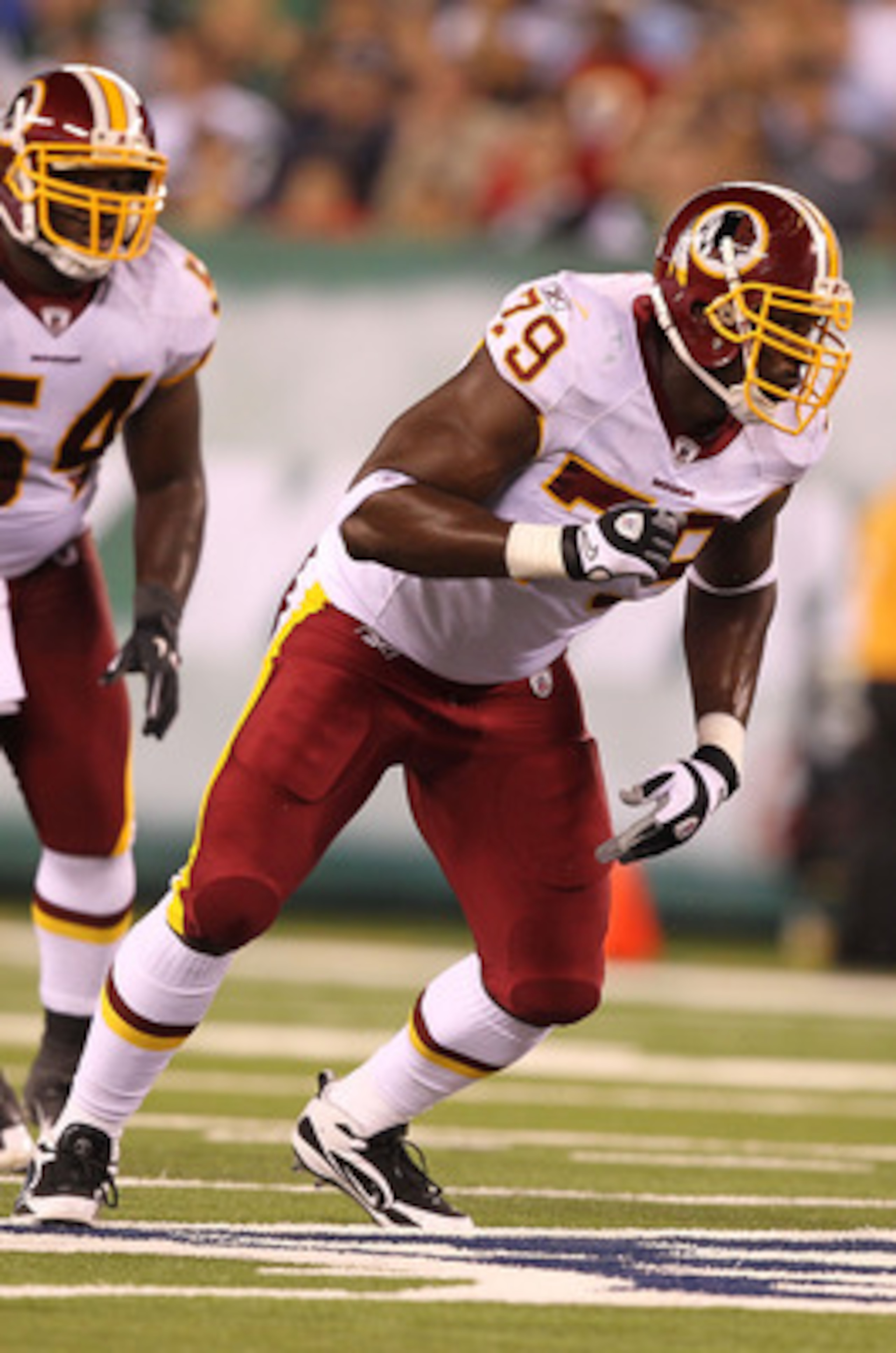 EAST RUTHERFORD, NJ - AUGUST 27:  Vonnie Holiday #79 of the Washington Redskins  in action against Vonnie Holiday during their preseason game on August 27, 2010 at the New Meadowlands Stadium  in East Rutherford, New Jersey.  (Photo by Al Bello/Getty Imag
