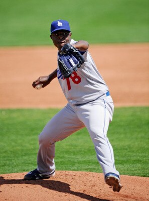 SCOTTSDALE, AZ - MARCH 18:  Pitcher Rubby De La Rosa #78 of the Los Angeles Dodgers throws against the San Francisco Giants during the spring training baseball game at Scottsdale Stadium on March 18, 2011 in Scottsdale, Arizona.  (Photo by Kevork Djansezi