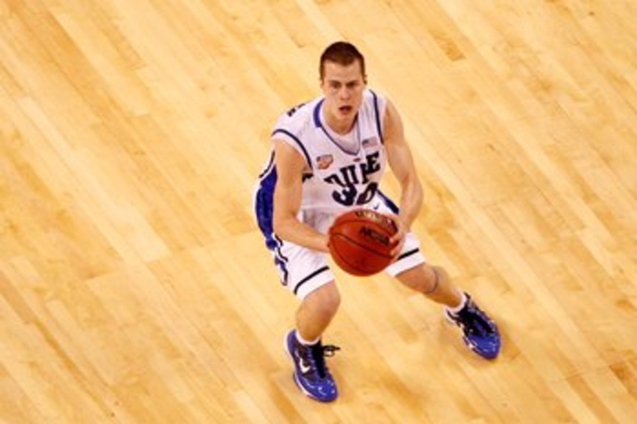 INDIANAPOLIS - APRIL 05: Jon Scheyer #20 of the Duke Blue Devils gets set to attempt a shot against the Butler Bulldogs during the 2010 NCAA Division I Men's Basketball National Championship game at Lucas Oil Stadium on April 5, 2010 in Indianapolis, Ind INDIANAPOLIS - APRIL 05: Jon Scheyer #20 of the Duke Blue Devils gets set to attempt a shot against the Butler Bulldogs during the 2010 NCAA Division I Men's Basketball National Championship game at Lucas Oil Stadium on April 5, 2010 in Indianapolis, Ind