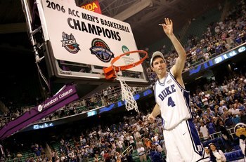 GREENSBORO, NC - MARCH 12:  J.J Redick #4 of the Duke Blue Devils salutes the crowd as he cuts down the net after his team's 78-76 win over the Boston College Eagles during the finals of the Atlantic Coast Conference Men's Basketball Tournament on March 1
