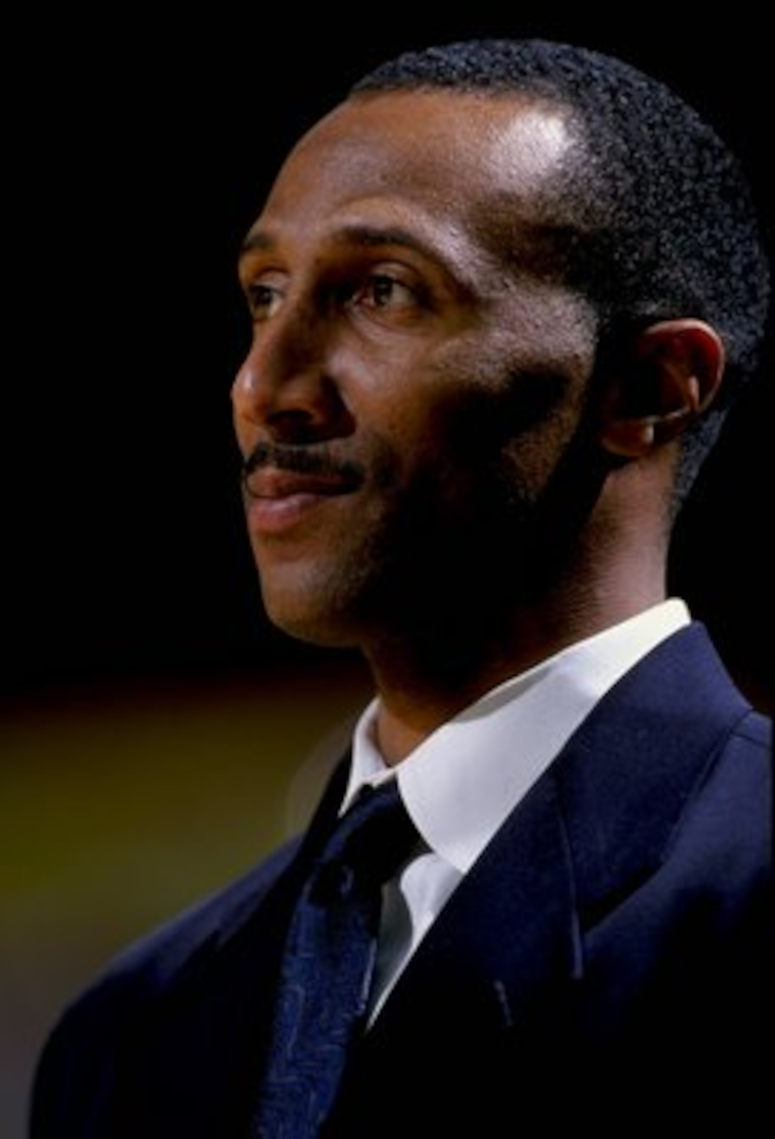 25 Nov 1998: Assistant coach Johnny Dawkins of the Duke Blue Devils watches from the bench during the Carrs Great Alaska Shootout Game against the Notre Dame Fighting Irish at the Sullivan Arena in Anchorage, Alaska. Duke defeated Notre Dame 111-82. Manda 25 Nov 1998: Assistant coach Johnny Dawkins of the Duke Blue Devils watches from the bench during the Carrs Great Alaska Shootout Game against the Notre Dame Fighting Irish at the Sullivan Arena in Anchorage, Alaska. Duke defeated Notre Dame 111-82. Manda