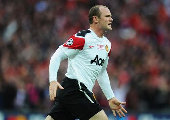 LONDON, ENGLAND - MAY 28:  Wayne Rooney of Manchester United celebrates scoring the equalising goal during the UEFA Champions League final between FC Barcelona and Manchester United FC at Wembley Stadium on May 28, 2011 in London, England.  (Photo by Cliv