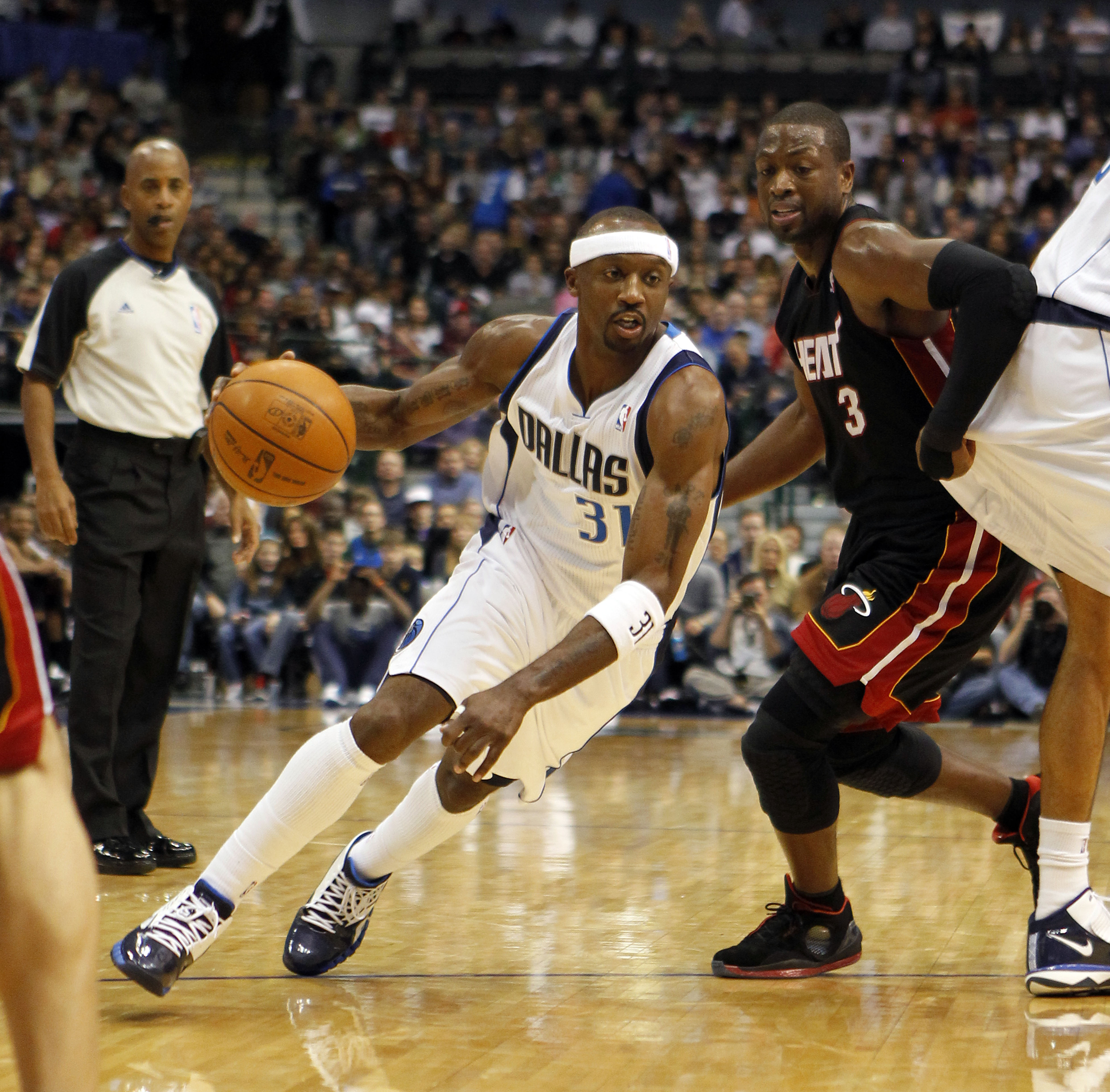 DALLAS - NOVEMBER 27: Jason Terry #31 of the Dallas Mavericks drives by Dwyane Wade #3 of the Miami Heat on November 27, 2010 at the American Airlines Center in Dallas, Texas. NOTE TO USER: User expressly acknowledges and agrees that, by downloading and o DALLAS - NOVEMBER 27: Jason Terry #31 of the Dallas Mavericks drives by Dwyane Wade #3 of the Miami Heat on November 27, 2010 at the American Airlines Center in Dallas, Texas. NOTE TO USER: User expressly acknowledges and agrees that, by downloading and o