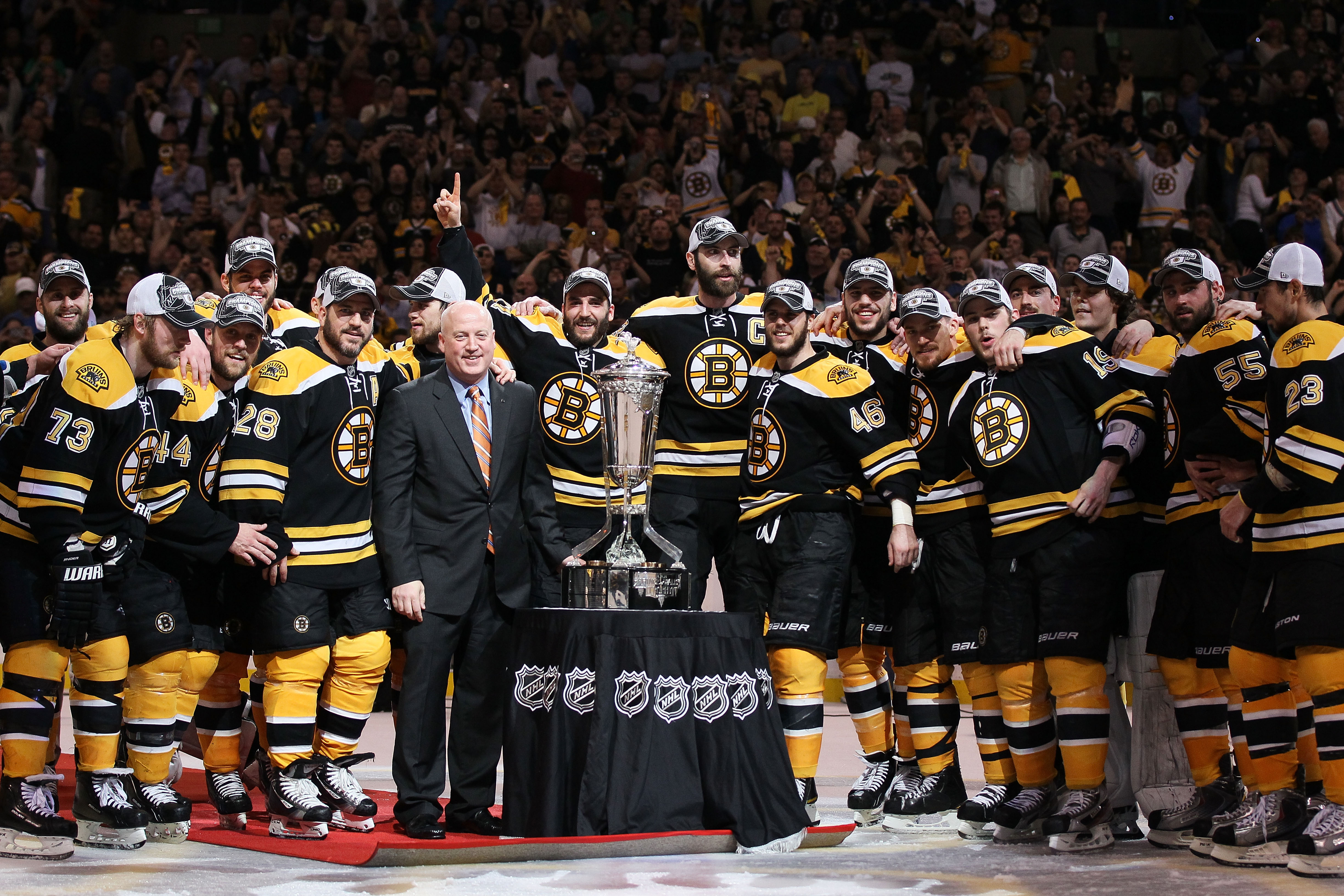 BOSTON, MA - MAY 27:  The Prince of Wales trophy is presented to the Boston Bruins by Deputy Commissioner Bill Daly after they defeated the Tampa Bay Lightning 1 to 0 in Game Seven of the Eastern Conference Finals during the 2011 NHL Stanley Cup Playoffs 