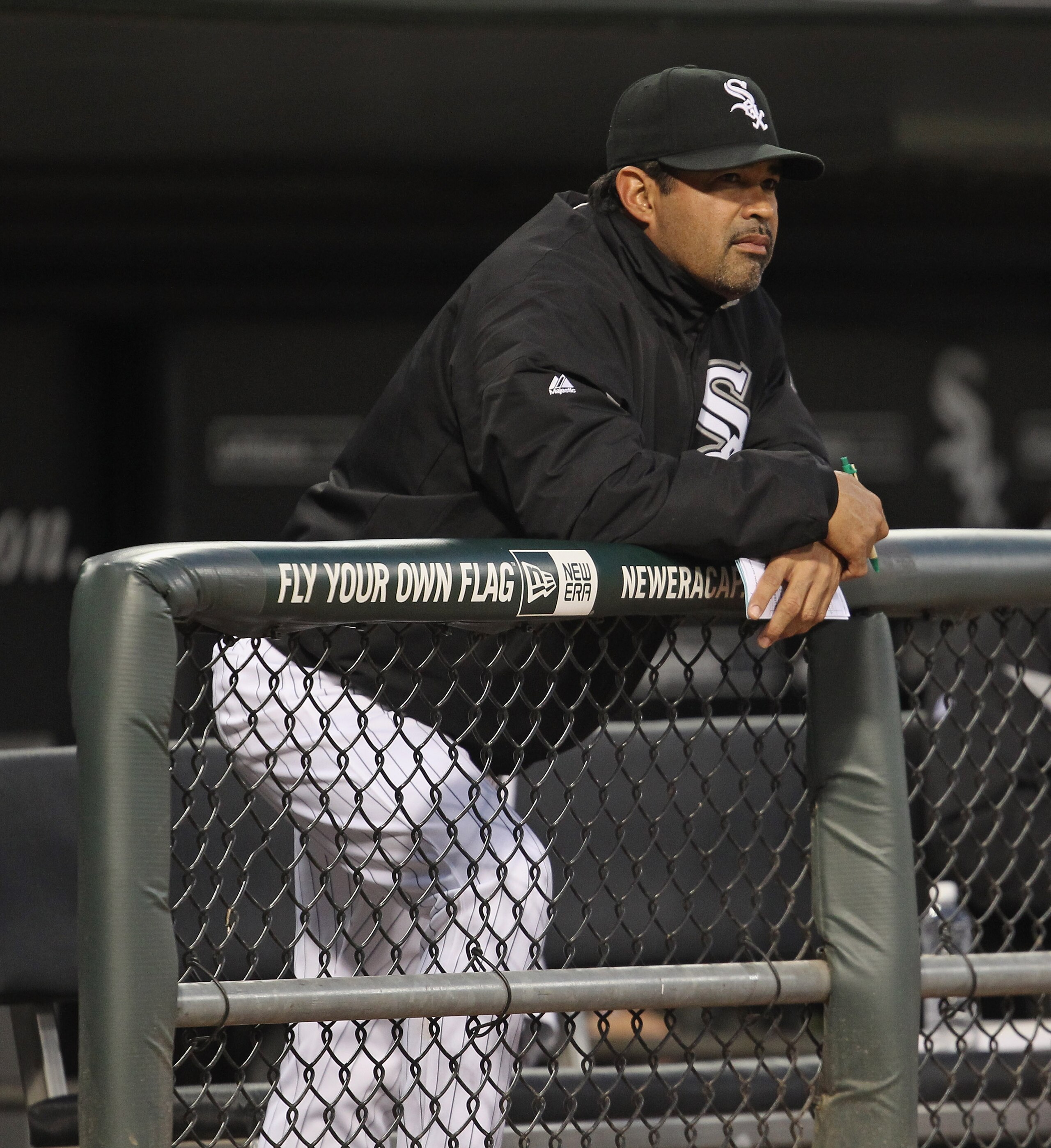 CHICAGO, IL - MAY 17: Manager Ozzie Guillen #13 of the Chicago White Sox watches as his team takes on the Texas Rangers at U.S. Cellular Field on May 17, 2011 in Chicago, Illinois. The White Sox defeated the Rangers 4-3. (Photo by Jonathan Daniel/Getty Im