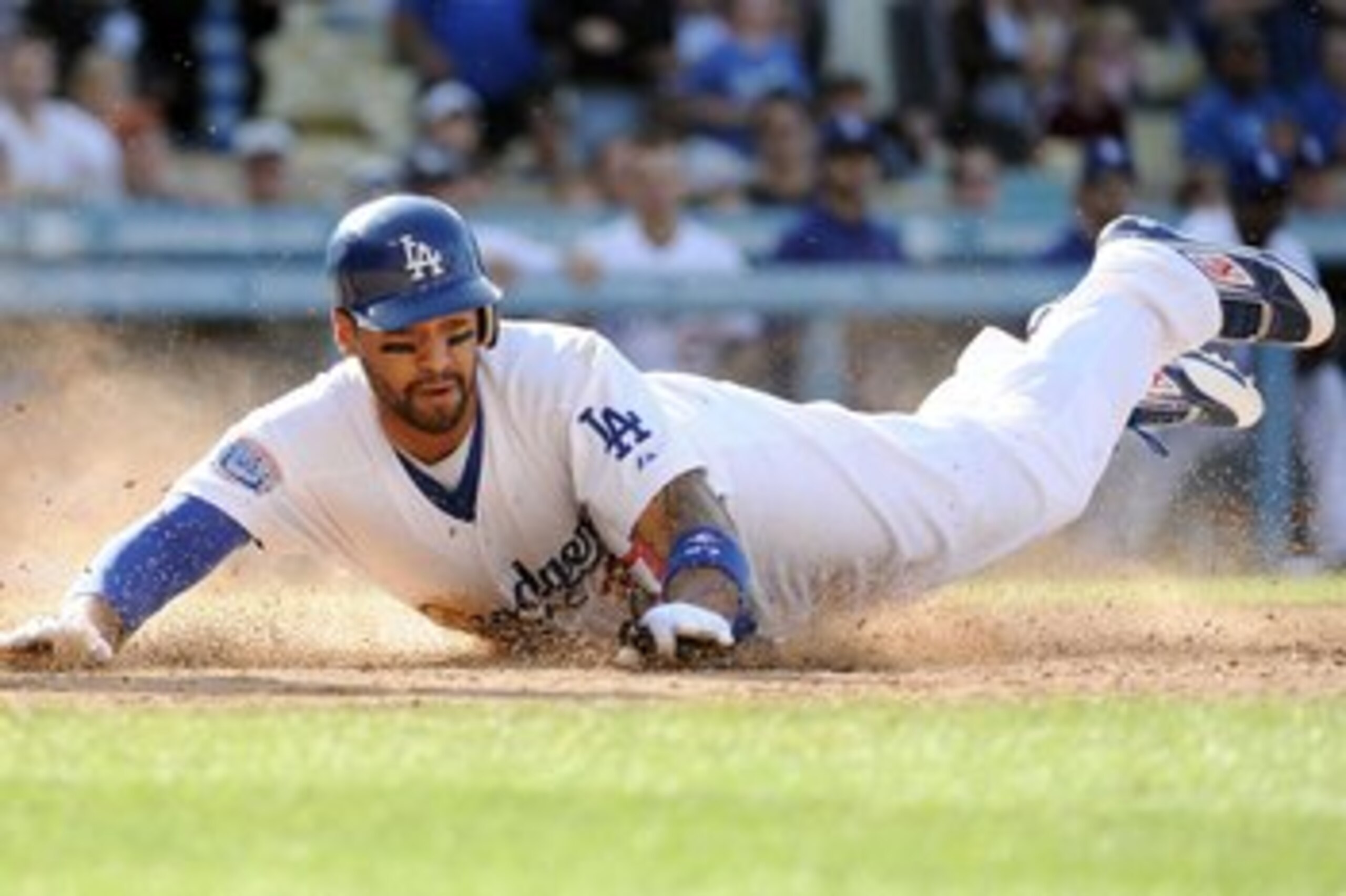 LOS ANGELES, CA - MAY 22: Matt Kemp #27 of the Los Angeles Dodgers dives home to score a run against the Detroit Tigers during the game at Dodger Stadium on May 22, 2010 in Los Angeles, California. (Photo by Harry How/Getty Images) LOS ANGELES, CA - MAY 22: Matt Kemp #27 of the Los Angeles Dodgers dives home to score a run against the Detroit Tigers during the game at Dodger Stadium on May 22, 2010 in Los Angeles, California. (Photo by Harry How/Getty Images)