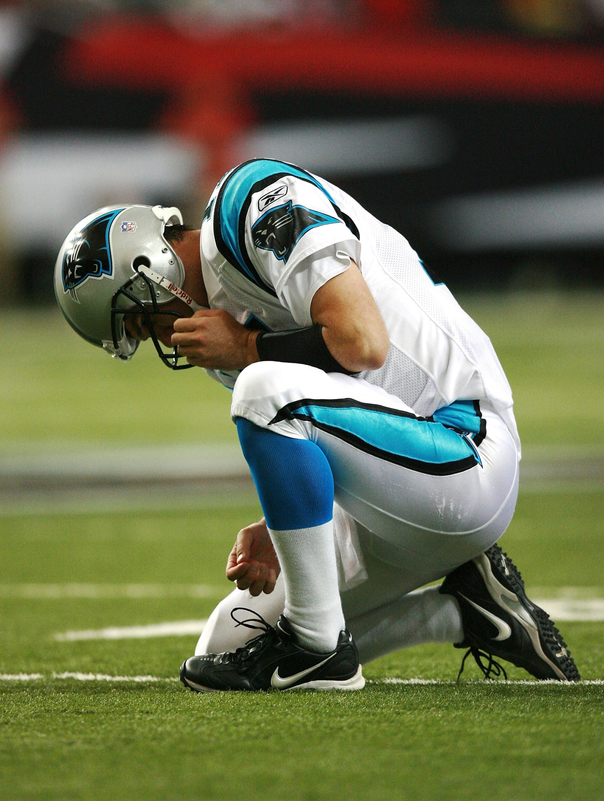 ATLANTA - SEPTEMBER 23:  Quarterback Jake Delhomme #17 of the Carolina Panthers reacts after injuring his right arm against the Atlanta Falcons at Georgia Dome September 23, 2007 in Atlanta, Georgia. The Panthers defeated the Falcons 27-20.  (Photo by Dou