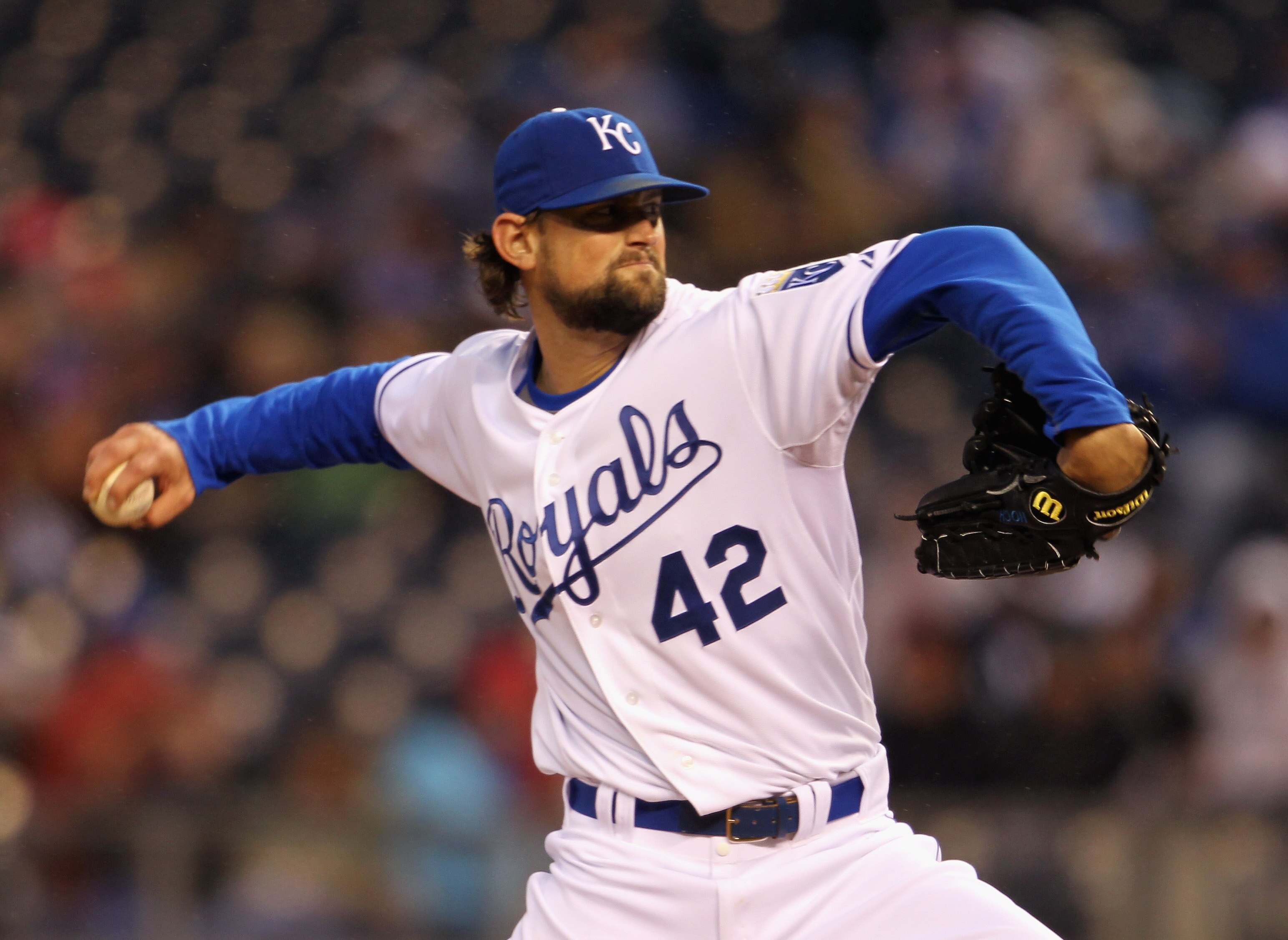 KANSAS CITY, MO - APRIL 15:  Starting pitcher Luke Hochevar #42 of the Kansas City Royals in action during the game against the Seattle Mariners at Kauffman Stadium on April 15, 2011 in Kansas City, Missouri.  (Photo by Jamie Squire/Getty Images)