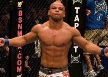 Thiago Alves celebrating a victory inside the Octagon