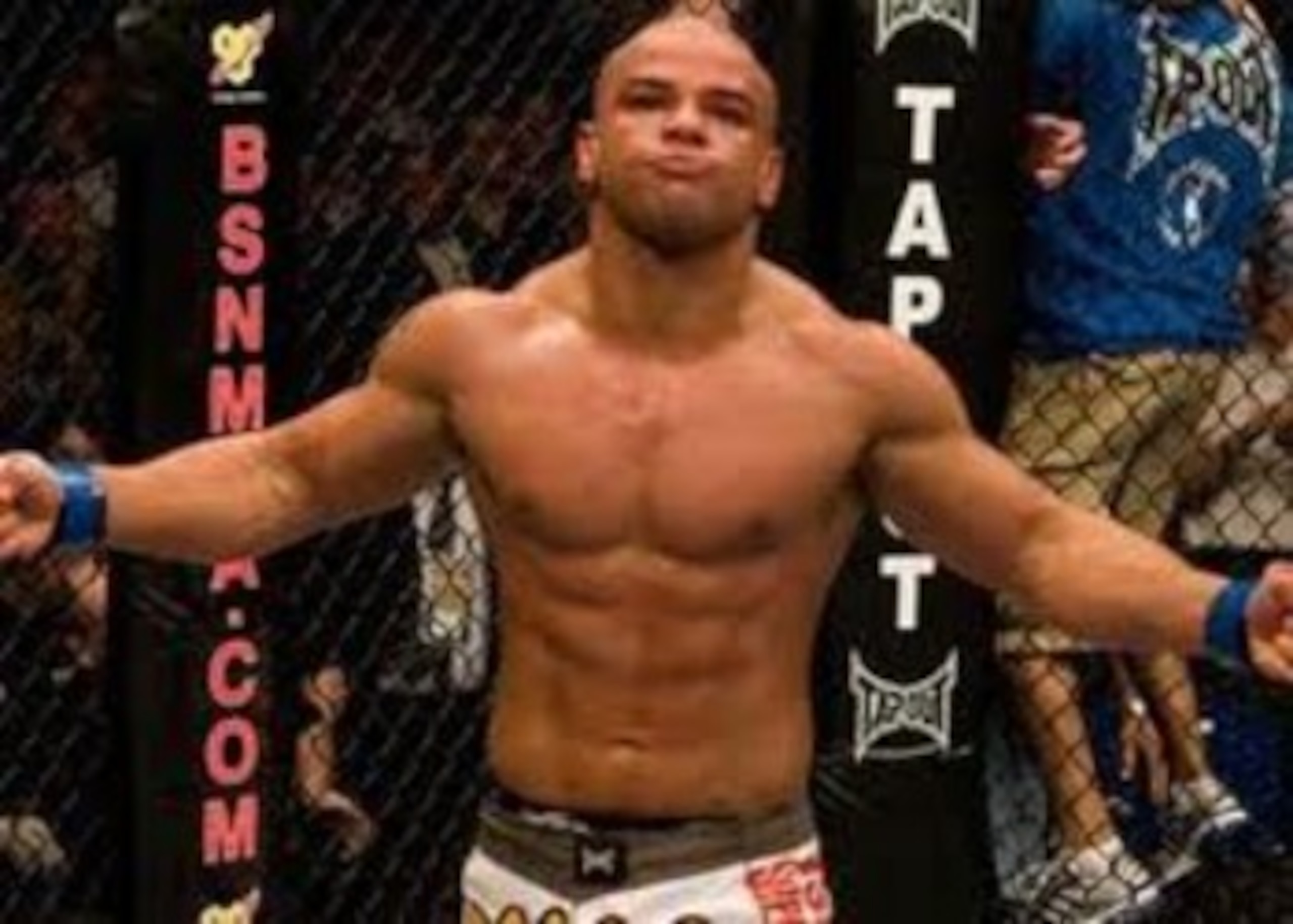 Thiago Alves celebrating a victory inside the Octagon