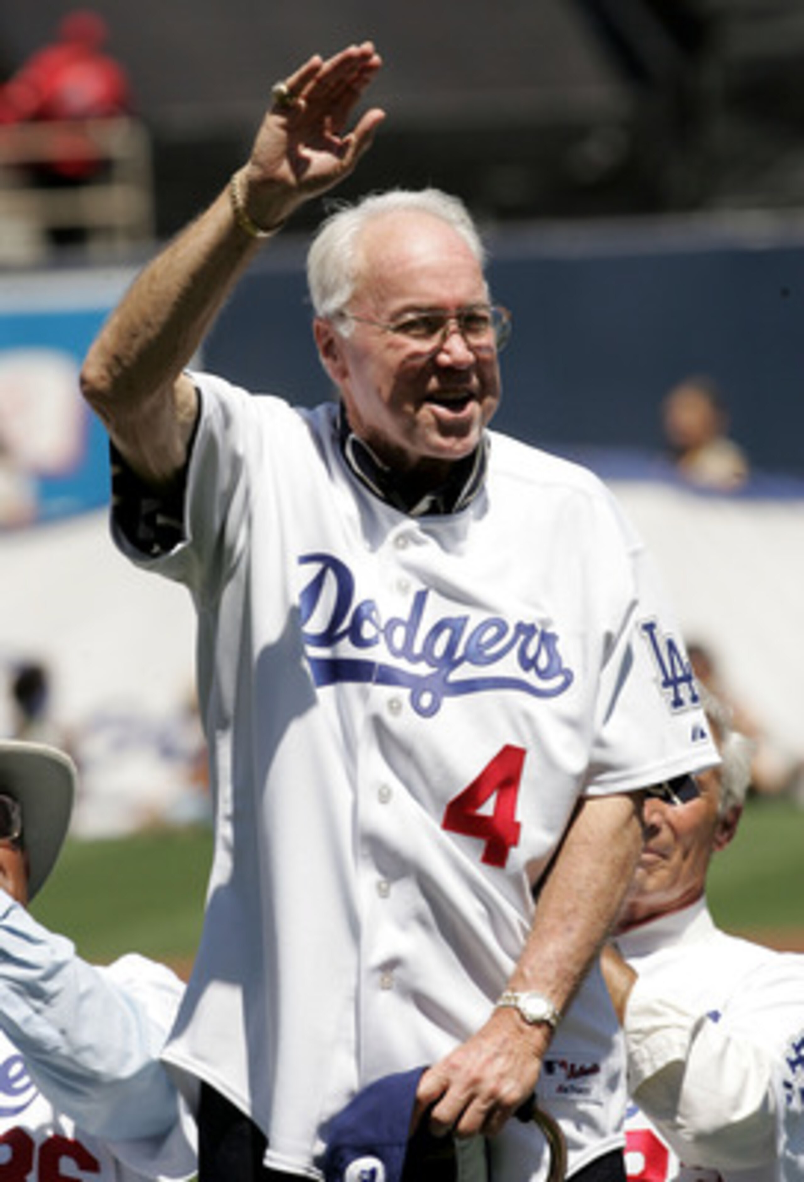 LOS ANGELES - AUGUST 28: Former outfielder Duke Snider of the Los Angeles Dodgers waves to the crowd during ceremonies honoring memebers of the 1955 World Champion Dodgers before the game with the Houston Astros on August 28, 2005 at Dodger Stadium in Los LOS ANGELES - AUGUST 28: Former outfielder Duke Snider of the Los Angeles Dodgers waves to the crowd during ceremonies honoring memebers of the 1955 World Champion Dodgers before the game with the Houston Astros on August 28, 2005 at Dodger Stadium in Los