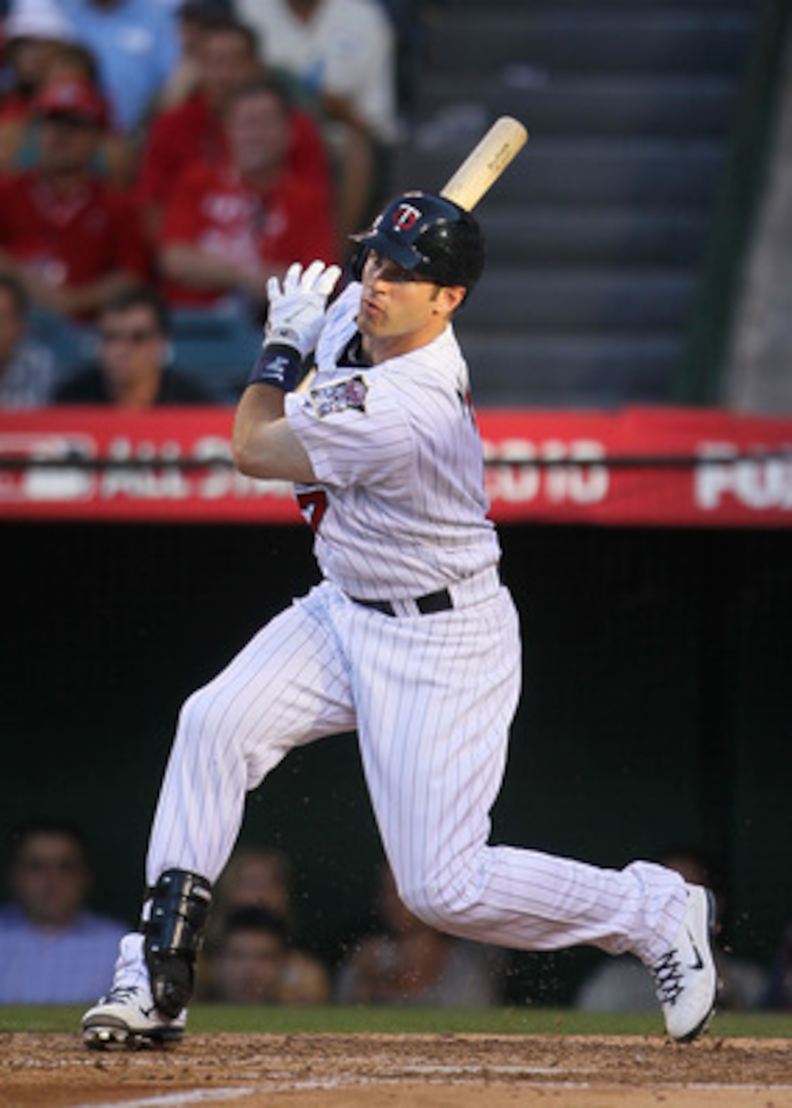 ANAHEIM, CA - JULY 13: American League All-Star Joe Mauer #7 of the Minnesota Twins swings the bat during the 81st MLB All-Star Game at Angel Stadium of Anaheim on July 13, 2010 in Anaheim, California. (Photo by Jeff Gross/Getty Images) ANAHEIM, CA - JULY 13: American League All-Star Joe Mauer #7 of the Minnesota Twins swings the bat during the 81st MLB All-Star Game at Angel Stadium of Anaheim on July 13, 2010 in Anaheim, California. (Photo by Jeff Gross/Getty Images)