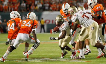 MIAMI, FL - OCTOBER 9: Chris Thompson #23 of the Florida State Seminoles runs with the ball against the Miami Hurricanes on October 9, 2010 at Sun Life Stadium in Miami, Florida. (Photo by Joel Auerbach/Getty Images)
