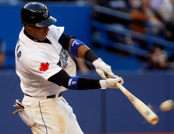 TORONTO, CANADA - MAY 9: Yunel Escobar #5 of the Toronto Blue Jays hits a home run against Max Scherzer of the Detroit Tigers during MLB action at the Rogers Centre May 9, 2011 in Toronto, Ontario, Canada. (Photo by Abelimages/Getty Images)