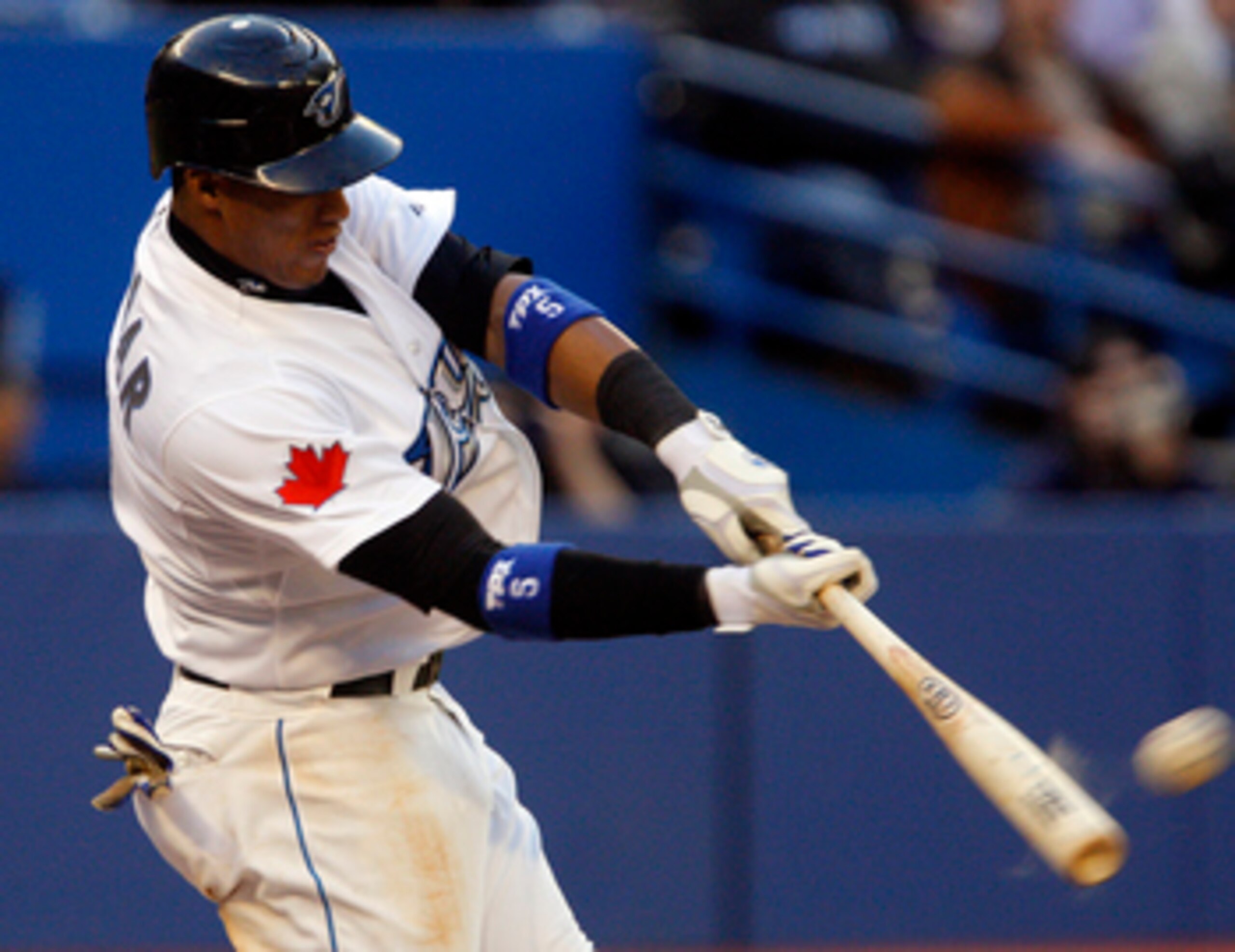TORONTO, CANADA - MAY 9: Yunel Escobar #5 of the Toronto Blue Jays hits a home run against Max Scherzer of the Detroit Tigers during MLB action at the Rogers Centre May 9, 2011 in Toronto, Ontario, Canada. (Photo by Abelimages/Getty Images)