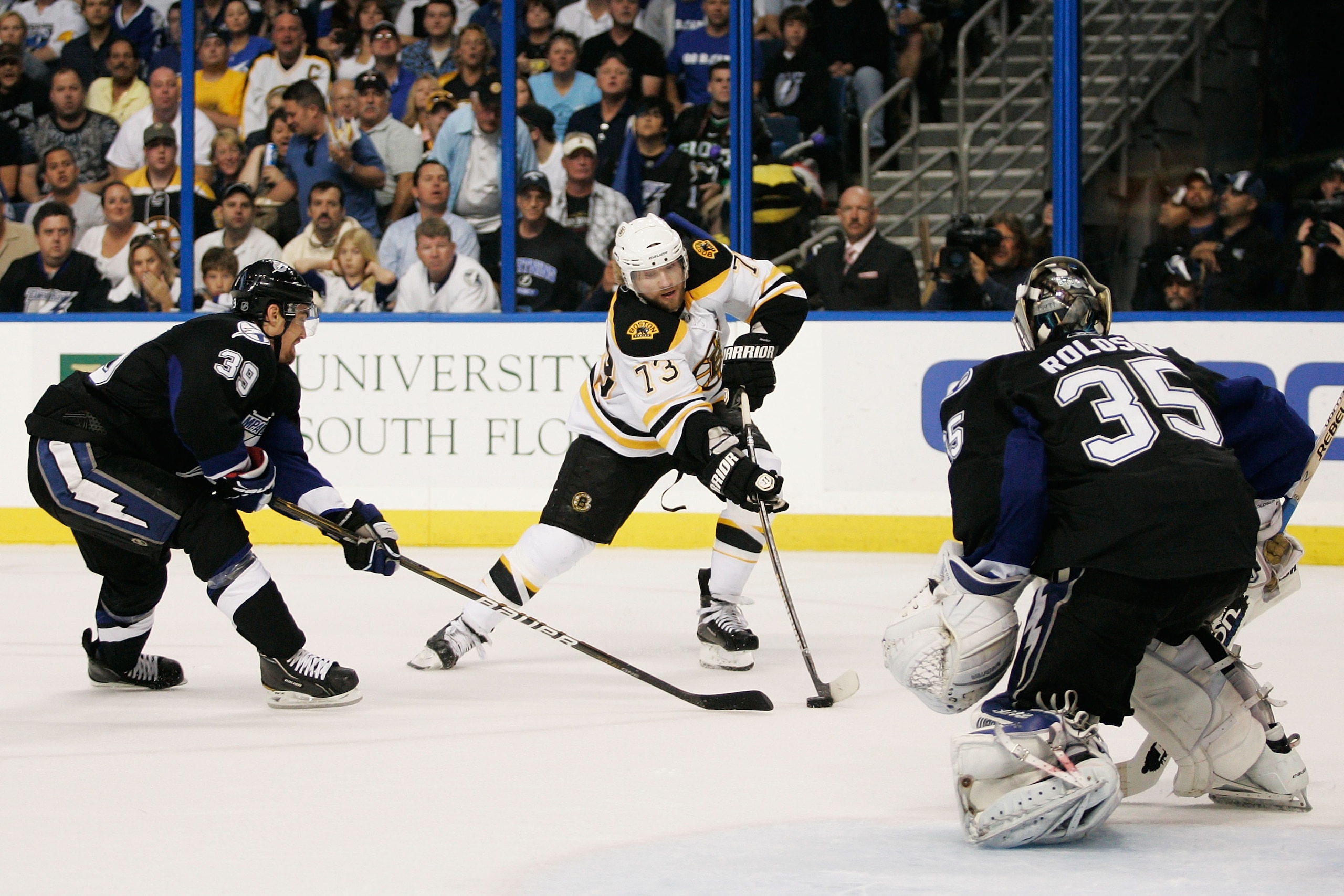 TAMPA, FL - MAY 21:  Michael Ryder #73 of the Boston Bruins shoots a first period goal against the defense of Mike Lundin #39 and Dwayne Roloson #35 of the Tampa Bay Lightning in Game Four of the Eastern Conference Finals during the 2011 NHL Stanley Cup P