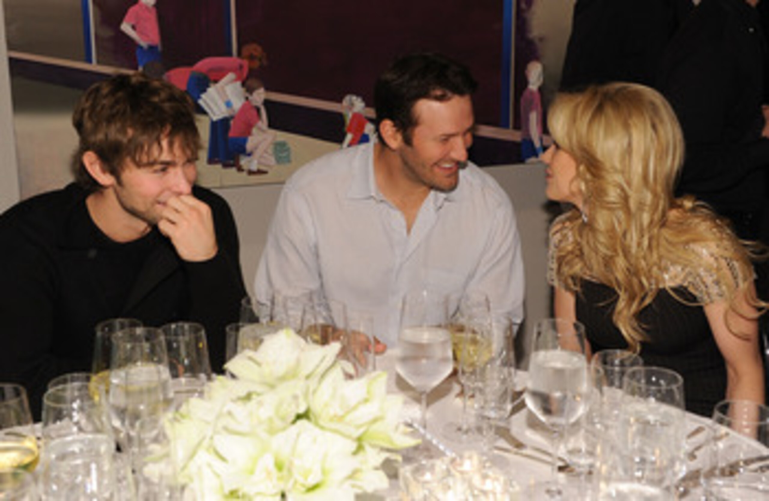 DALLAS, TX - FEBRUARY 05: (L-R) Actor Chace Crawford, Dallas Cowboys Quaterback Tony Romo and television persoanlity Candice Crawford attend a private dinner hosted by Audi during Super Bowl XLV Weekend at the Audi Forum Dallas on February 5, 2011 in Dall