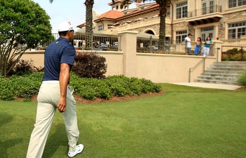 PONTE VEDRA BEACH, FL - MAY 12: Tiger Woods leaves the course after withdrawing after playing the ninth hole during the first round of THE PLAYERS Championship held at THE PLAYERS Stadium course at TPC Sawgrass on May 12, 2011 in Ponte Vedra Beach, Flori PONTE VEDRA BEACH, FL - MAY 12: Tiger Woods leaves the course after withdrawing after playing the ninth hole during the first round of THE PLAYERS Championship held at THE PLAYERS Stadium course at TPC Sawgrass on May 12, 2011 in Ponte Vedra Beach, Flori