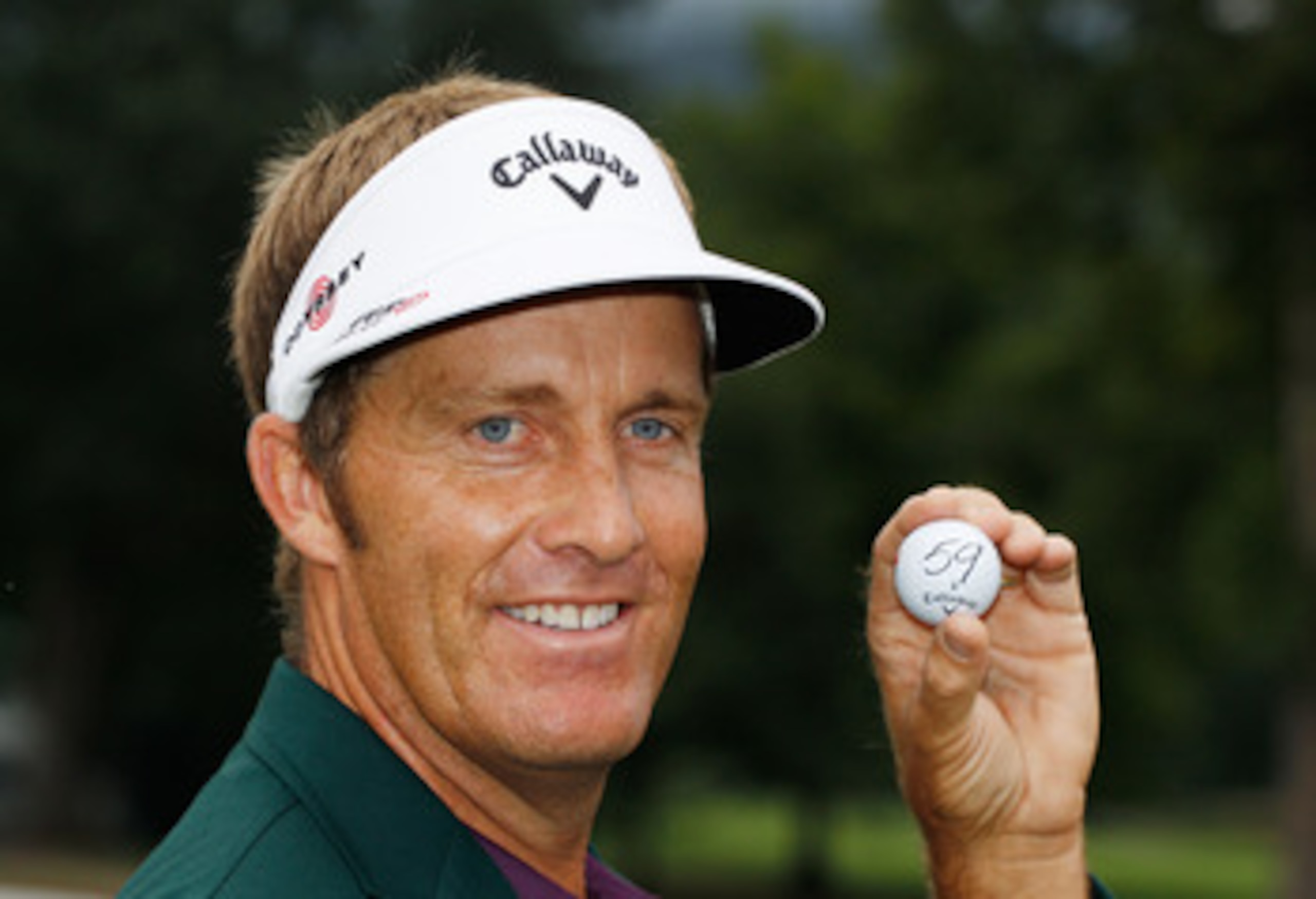 WHITE SULPHUR SPRINGS, WV - AUGUST 01:  Stuart Appleby of Australia poses with his golf ball after he finished with an 11-under par 59 during the final round of the Greenbrier Classic on The Old White Course at the Greenbrier Resort  on August 1, 2010 in