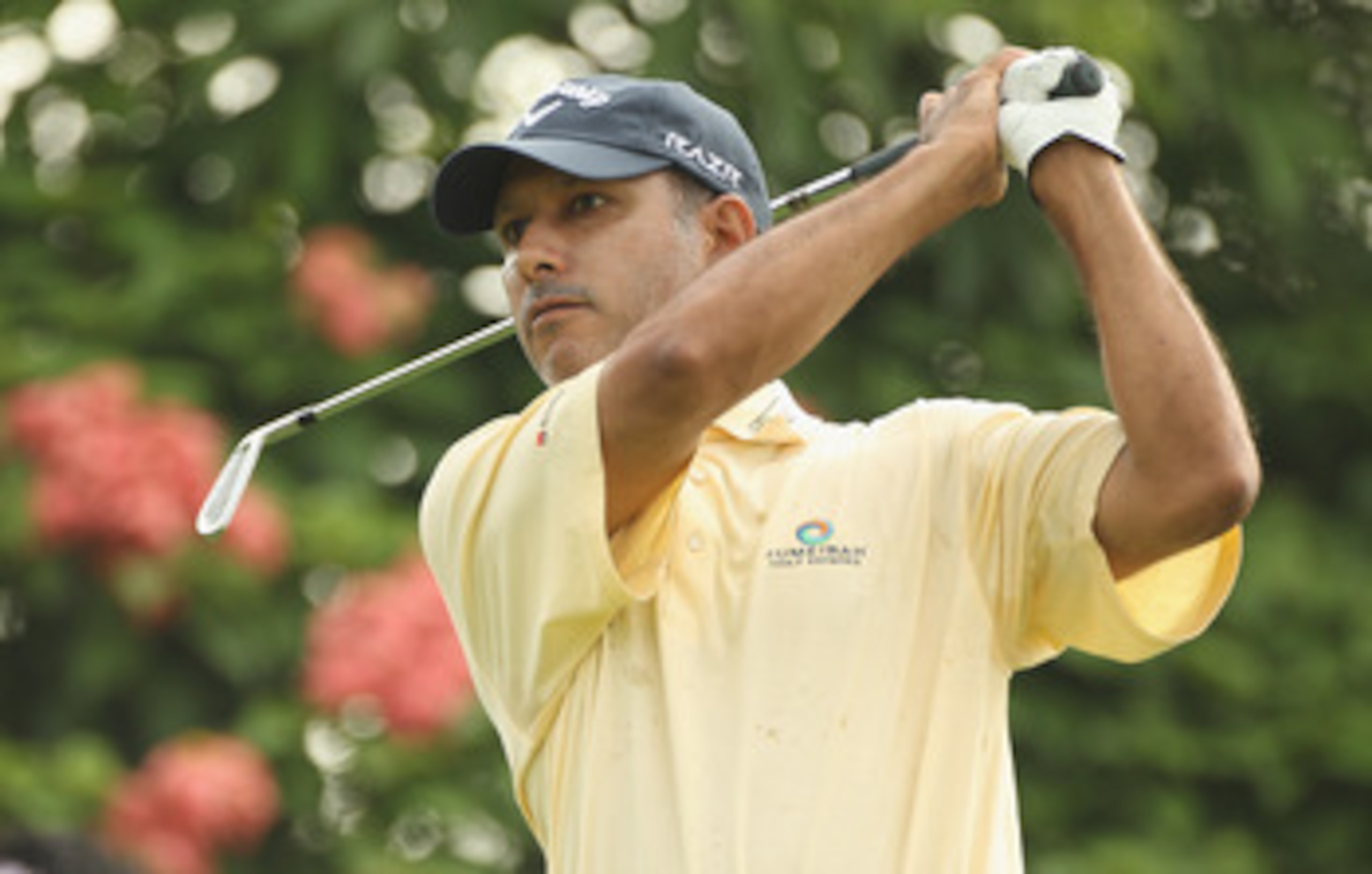 KUALA LUMPUR, MALAYSIA - APRIL 14:  Jeev Milka Singh of India in action during the first round of the Maybank Malaysian Open at Kuala Lumpur Golf & Country Club on April 14, 2011 in Kuala Lumpur, Malaysia.  (Photo by Ian Walton/Getty Images)