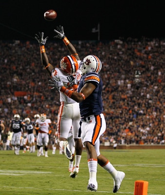 AUBURN, AL - SEPTEMBER 18:  Xavier Brewer #29 of the Clemson Tigers intercepts a pass intended for Shaun Kitchens #4 of the Auburn Tigers at Jordan-Hare Stadium on September 18, 2010 in Auburn, Alabama.  (Photo by Kevin C. Cox/Getty Images)