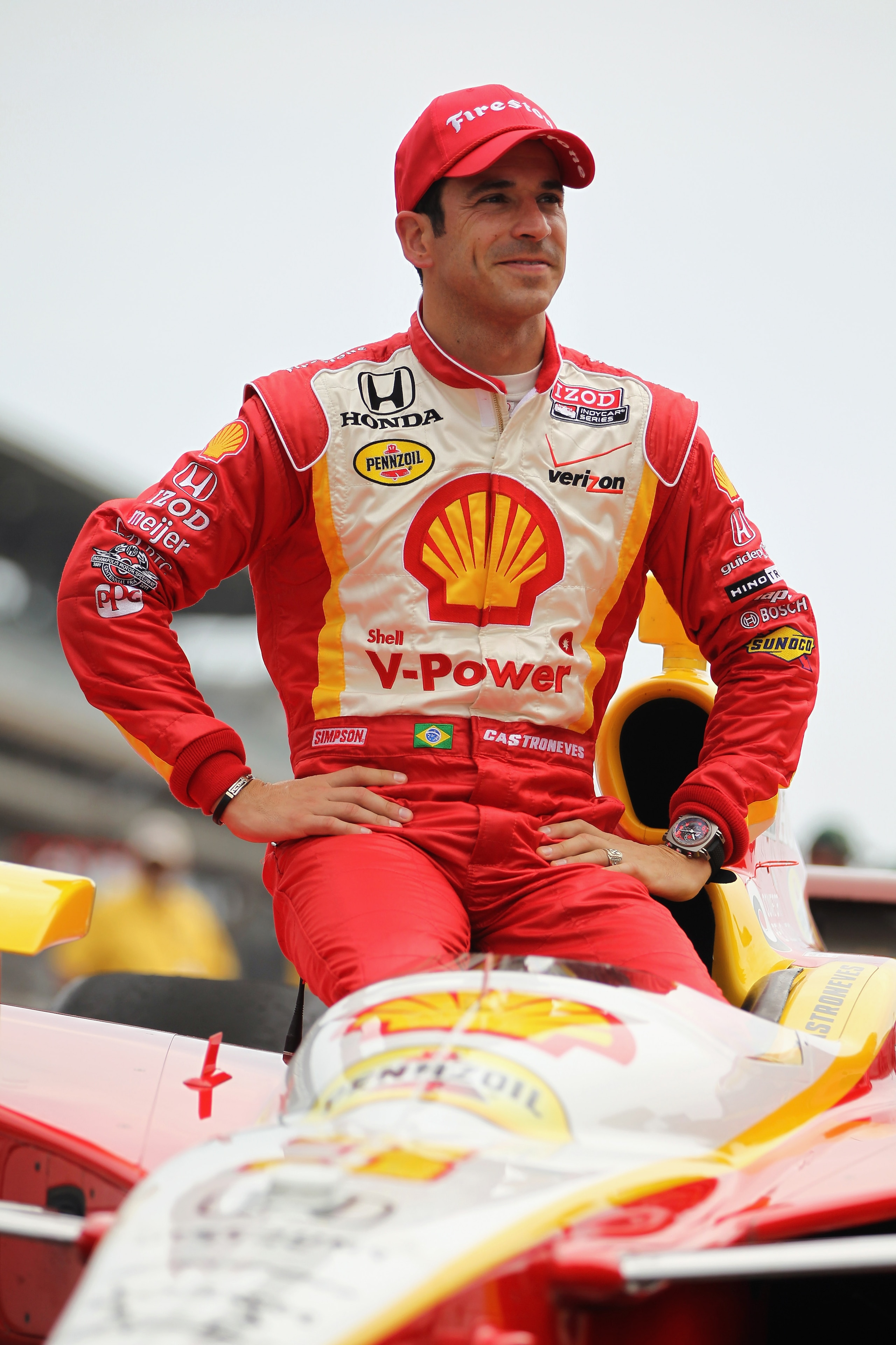 INDIANAPOLIS, IN - MAY 21: Helio Castroneves of Brazil, driver of the Shell V-Power/Penzoil Ultra Team Penske Dallara Honda, poses for an official portrait during qualifying for the Indianapolis 500 on May 21, 2011 at Indianapolis Motor Speedway in India INDIANAPOLIS, IN - MAY 21: Helio Castroneves of Brazil, driver of the Shell V-Power/Penzoil Ultra Team Penske Dallara Honda, poses for an official portrait during qualifying for the Indianapolis 500 on May 21, 2011 at Indianapolis Motor Speedway in India