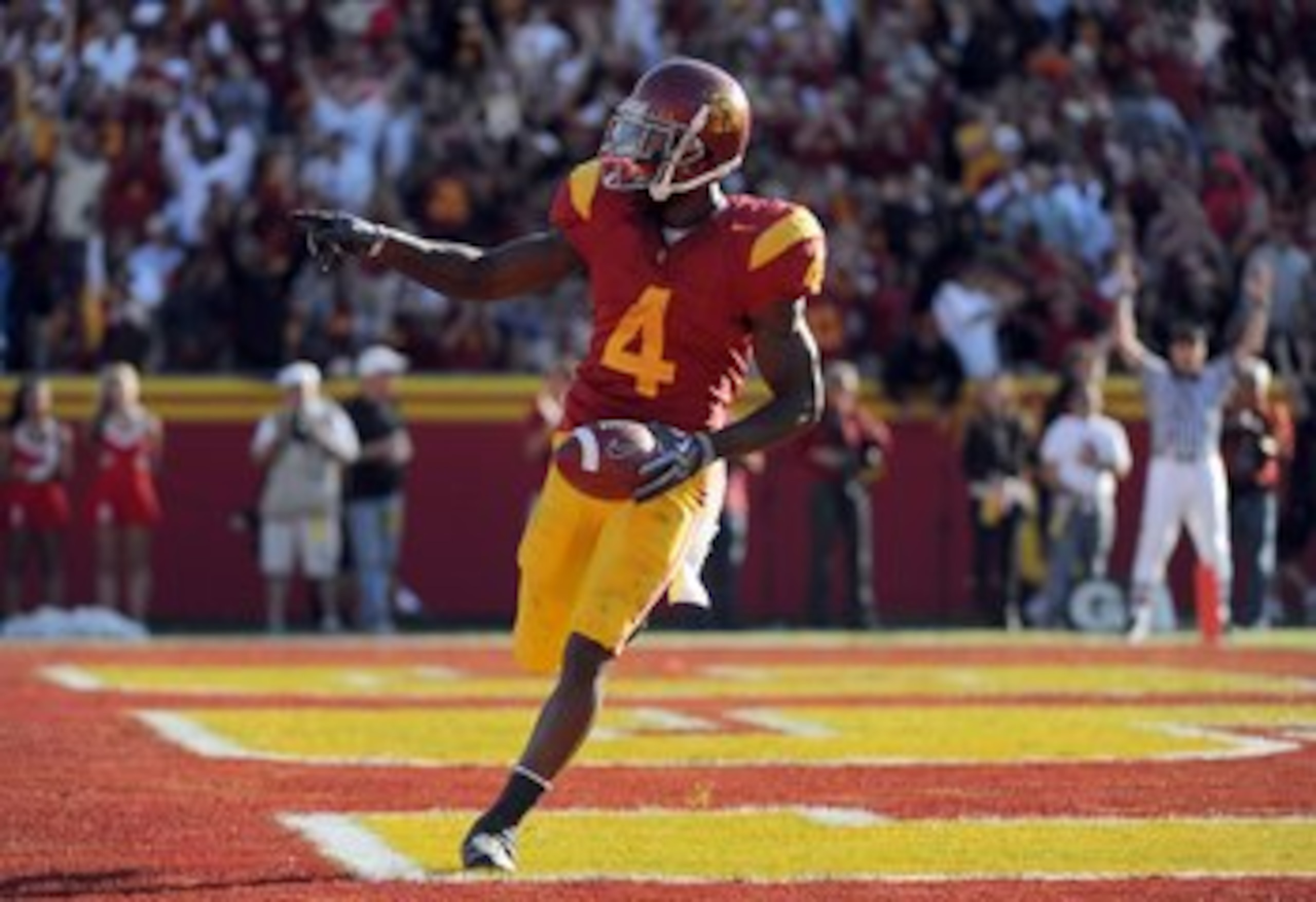 LOS ANGELES, CA - NOVEMBER 14:  Joe McKnight #4 of the USC Trojans celebrates his touchdown against the Stanford Cardinals during the second half at the Los Angeles Memorial Coliseum on November 14, 2009 in Los Angeles, California.  (Photo by Harry How/Ge