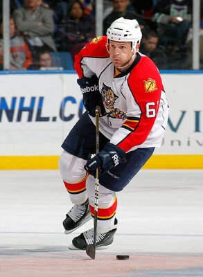 UNIONDALE, NY - FEBRUARY 21:  Cory Stillman #61 of the Florida Panthers skates during an NHL hockey game against the New York Islanders at the Nassau Coliseum on February 21, 2011 in Uniondale, New York.  (Photo by Paul Bereswill/Getty Images)
