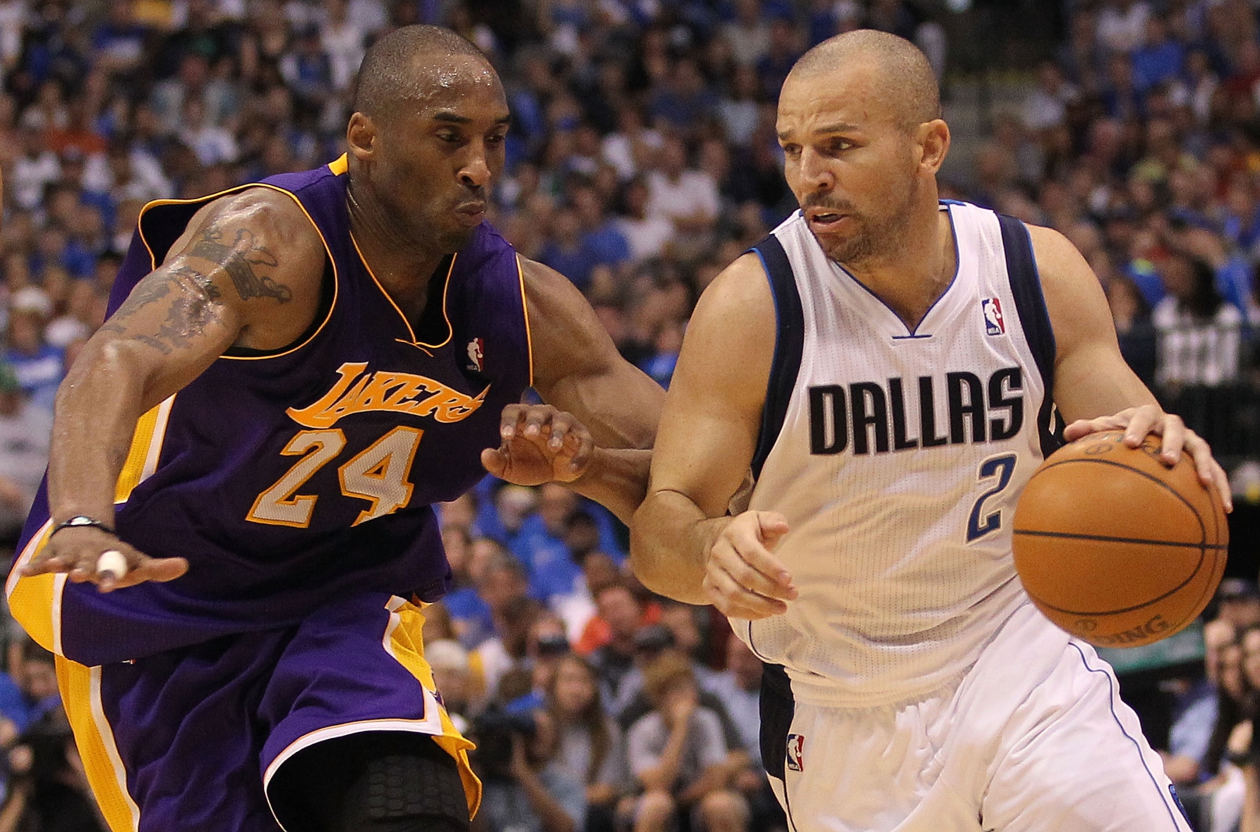 DALLAS, TX - MAY 08:  Guard Jason Kidd #2 of the Dallas Mavericks dribbles the ball past Kobe Bryant #24 of the Los Angeles Lakers in Game Four of the Western Conference Semifinals during the 2011 NBA Playoffs on May 8, 2011 at American Airlines Center in