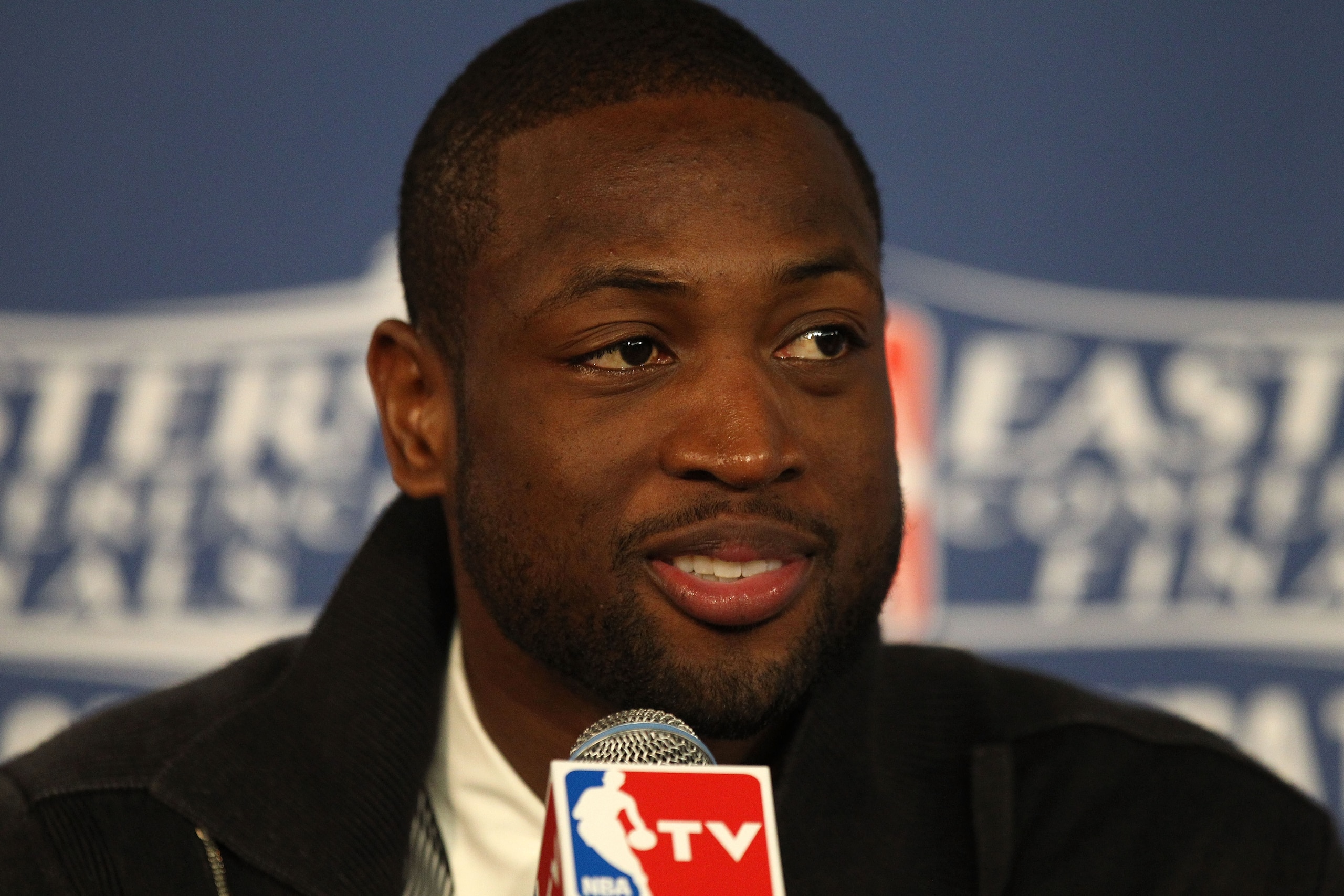 CHICAGO, IL - MAY 26:  Dwyane Wade #3 of the Miami Heat answers questions from the media at the post game press conference after the Heat won 83-80 against the Chicago Bulls in Game Five of the Eastern Conference Finals during the 2011 NBA Playoffs on May