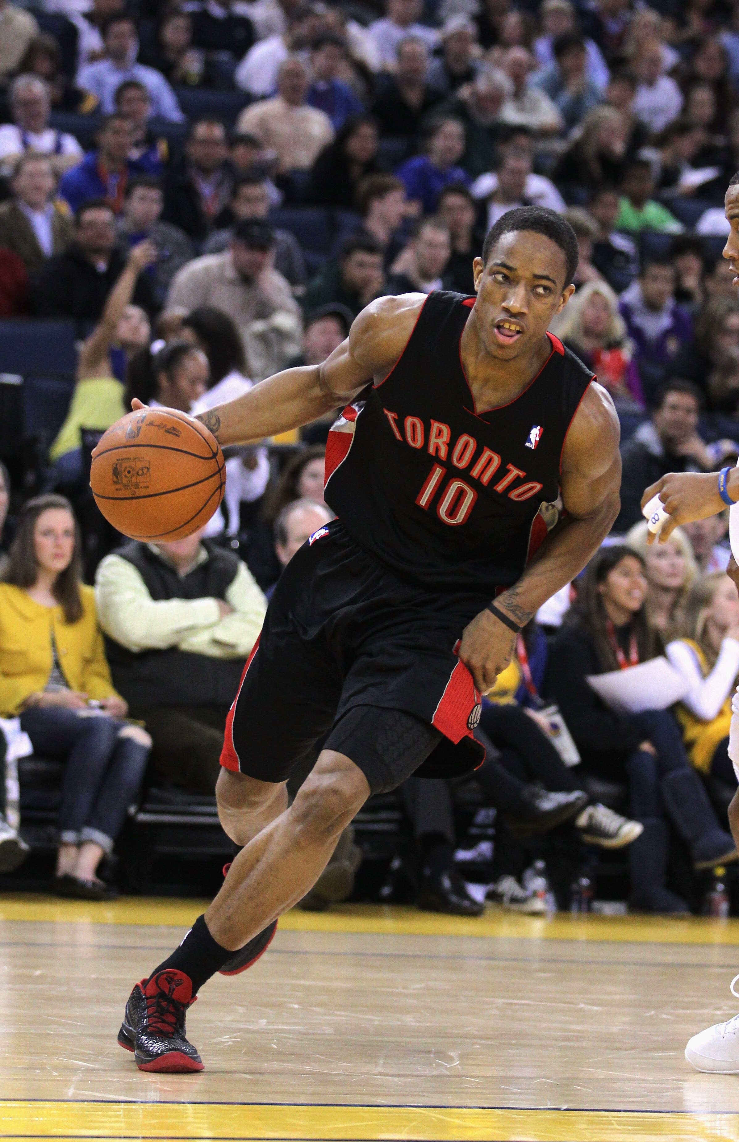 OAKLAND, CA - MARCH 25: DeMar DeRozan #10 of the Toronto Raptors in action against the Golden State Warriors at Oracle Arena on March 25, 2011 in Oakland, California. NOTE TO USER: User expressly acknowledges and agrees that, by downloading and or using t