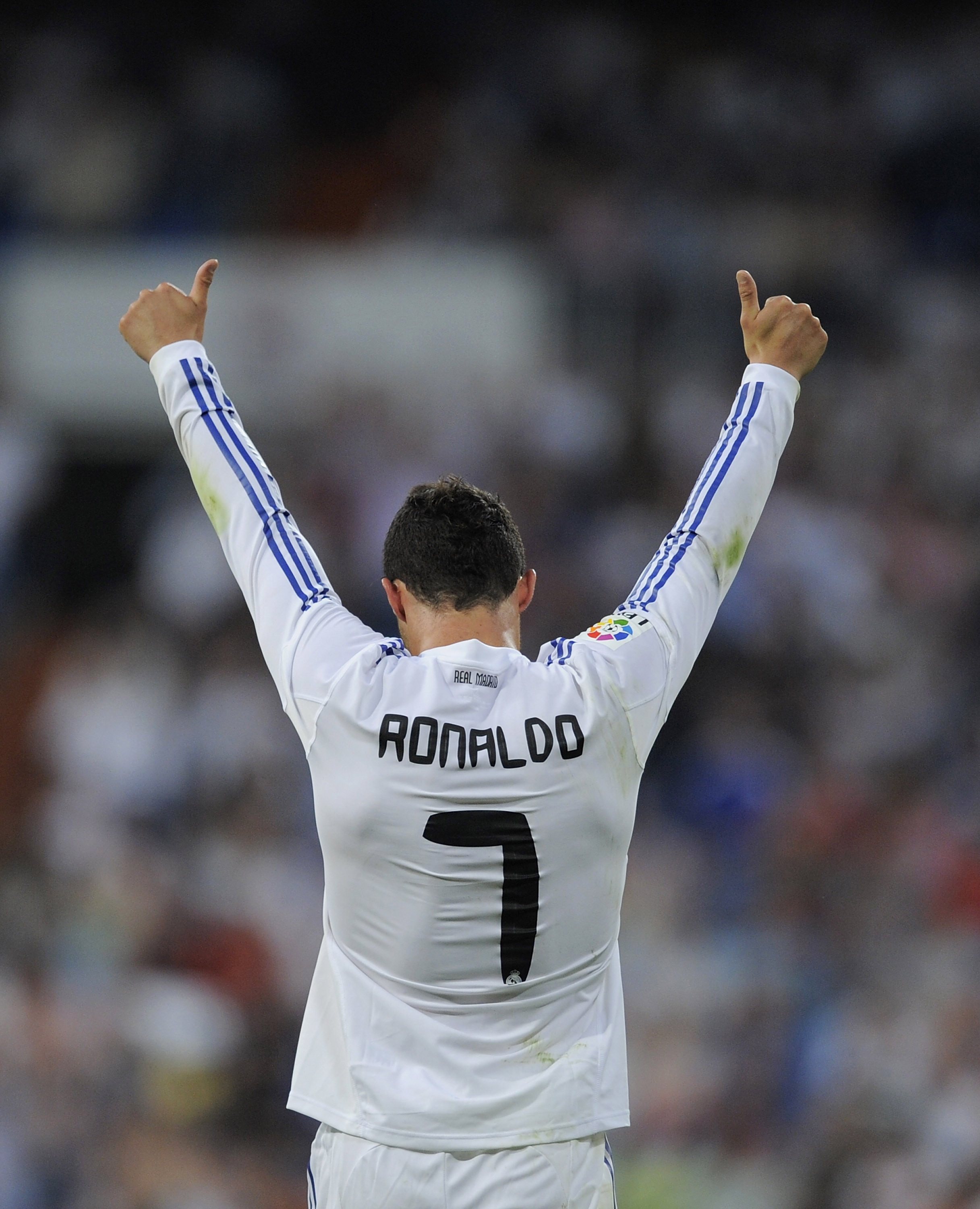 MADRID, SPAIN - MAY 21:  Cristiano Ronaldo of Real Madrid celebrates after scoring his 2nd goal during the La Liga match between Real Madrid and UD Almeria at Estadio Santiago Bernabeu on May 21, 2011 in Madrid, Spain.  (Photo by Denis Doyle/Getty Images)