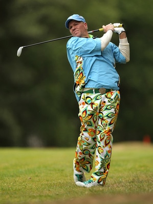 VIRGINIA WATER, ENGLAND - MAY 27: John Daly of the USA hits an approach shot during the second round of the BMW PGA Championship at the Wentworth Club on May 27, 2011 in Virginia Water, England. (Photo by Ian Walton/Getty Images) VIRGINIA WATER, ENGLAND - MAY 27: John Daly of the USA hits an approach shot during the second round of the BMW PGA Championship at the Wentworth Club on May 27, 2011 in Virginia Water, England. (Photo by Ian Walton/Getty Images)