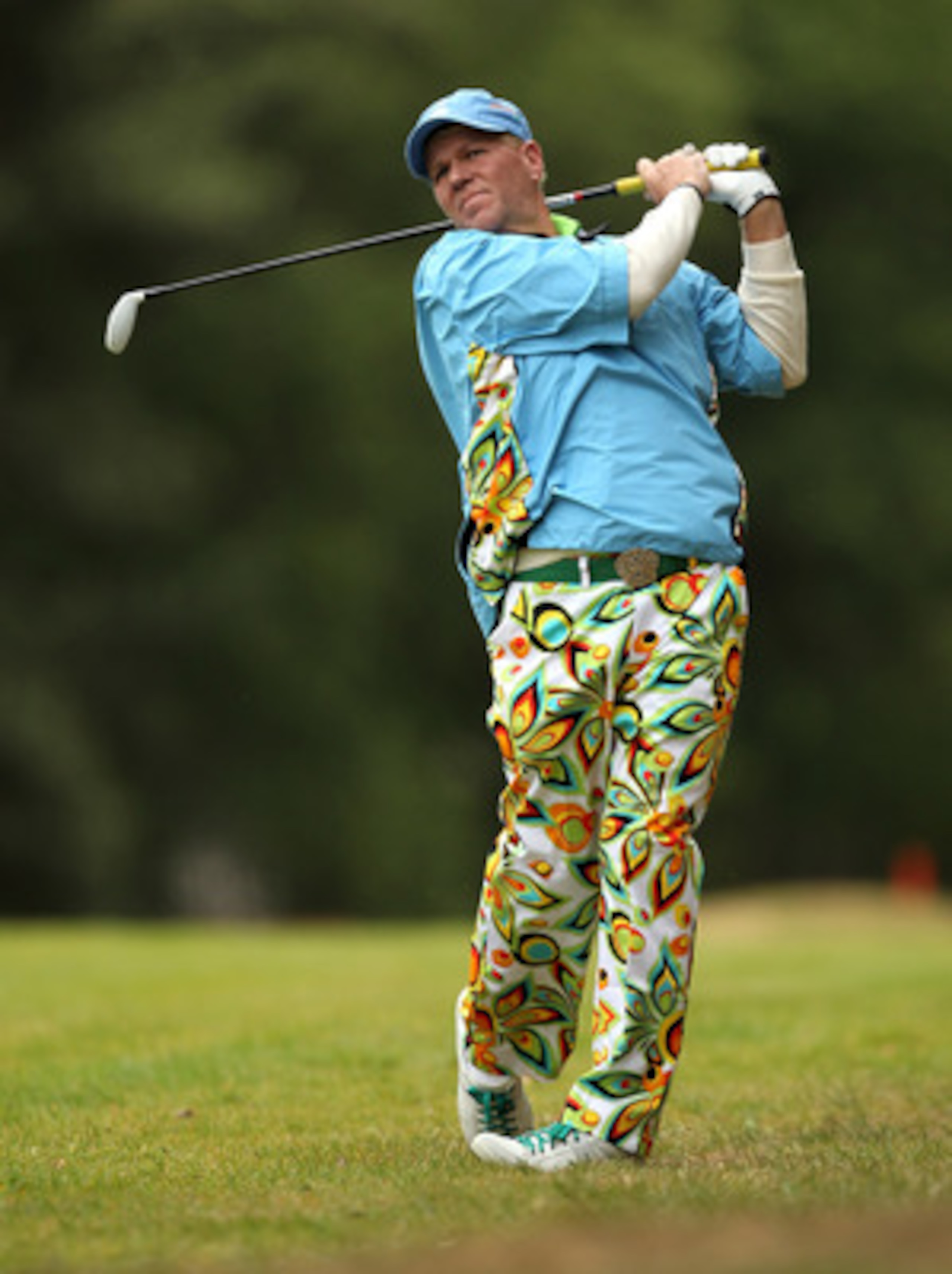 VIRGINIA WATER, ENGLAND - MAY 27:  John Daly of the USA hits an approach shot during the second round of the BMW PGA Championship at the Wentworth Club on May 27, 2011 in Virginia Water, England.  (Photo by Ian Walton/Getty Images)