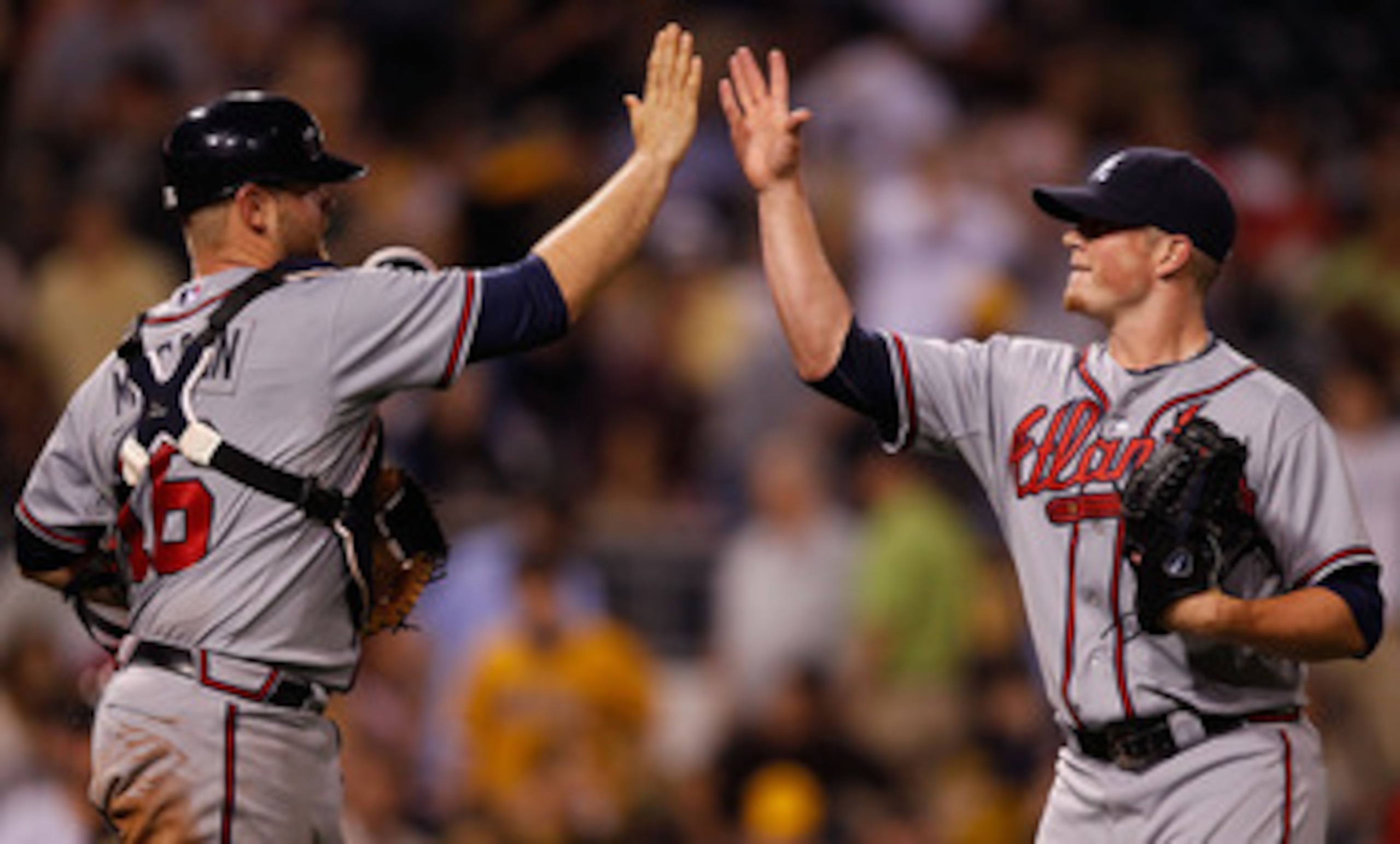 PITTSBURGH - MAY 24:  Craig Kimbrel #46 and teammate Brian McCann #16 of the Atlanta Braves celebrate after their win against the Pittsburgh Pirates during the game on May 24, 2011 at PNC Park in Pittsburgh, Pennsylvania.  (Photo by Jared Wickerham/Getty