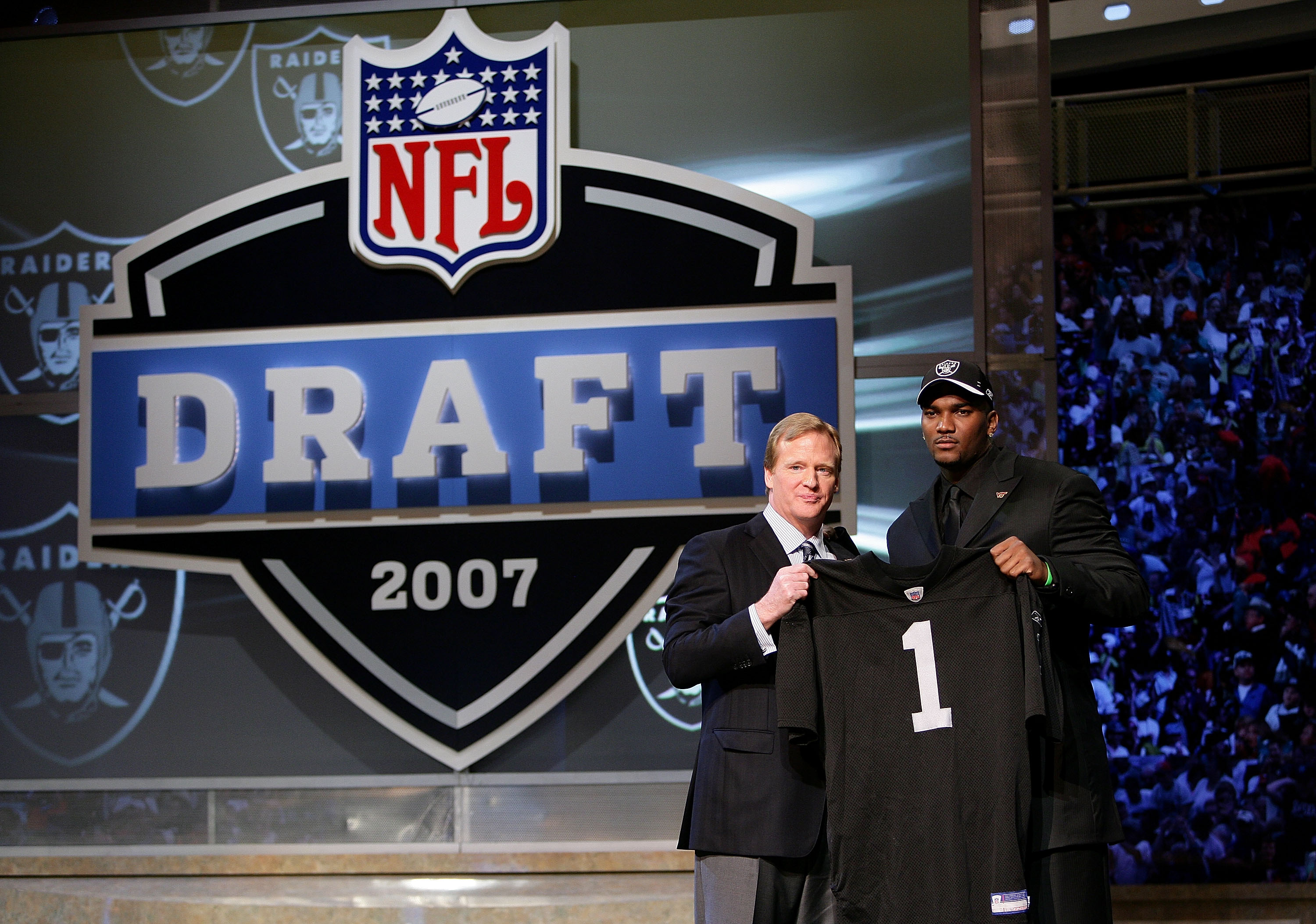 NEW YORK - APRIL 28:  JaMarcus Russell poses with NFL Commissioner Roger Goodell after being chosen first overall by the Oakland Raiders at the 2007 NFL Draft at Radio City Music Hall April 28, 2007 in New York City.  (Photo by Nick Laham/Getty Images)