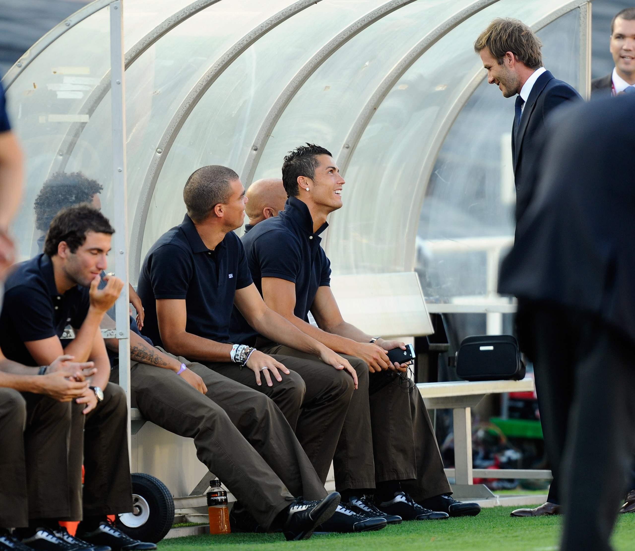PASADENA, CA - AUGUST 07:  David Beckham (R) of Los Angeles Galaxy greets Cristiano Ronaldo (C) of Real Madrid before their pre-season friendly soccer match on August 7, 2010 at the Rose Bowl in Pasadena, California. Real Madrid will travel back to Spain