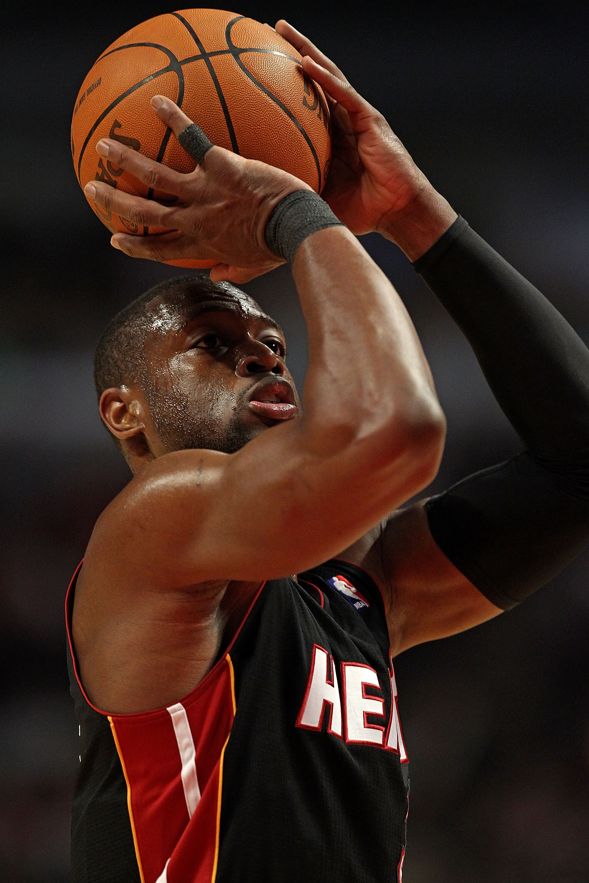CHICAGO, IL - FEBRUARY 24: Dwyane Wade #3 of the Miami Heat shoots free-throw against the Chicago Bulls at the United Center on February 24, 2011 in Chicago, Illinois. The Bulls defeated the Heat 93-89. NOTE TO USER: User expressly acknowledges and agrees