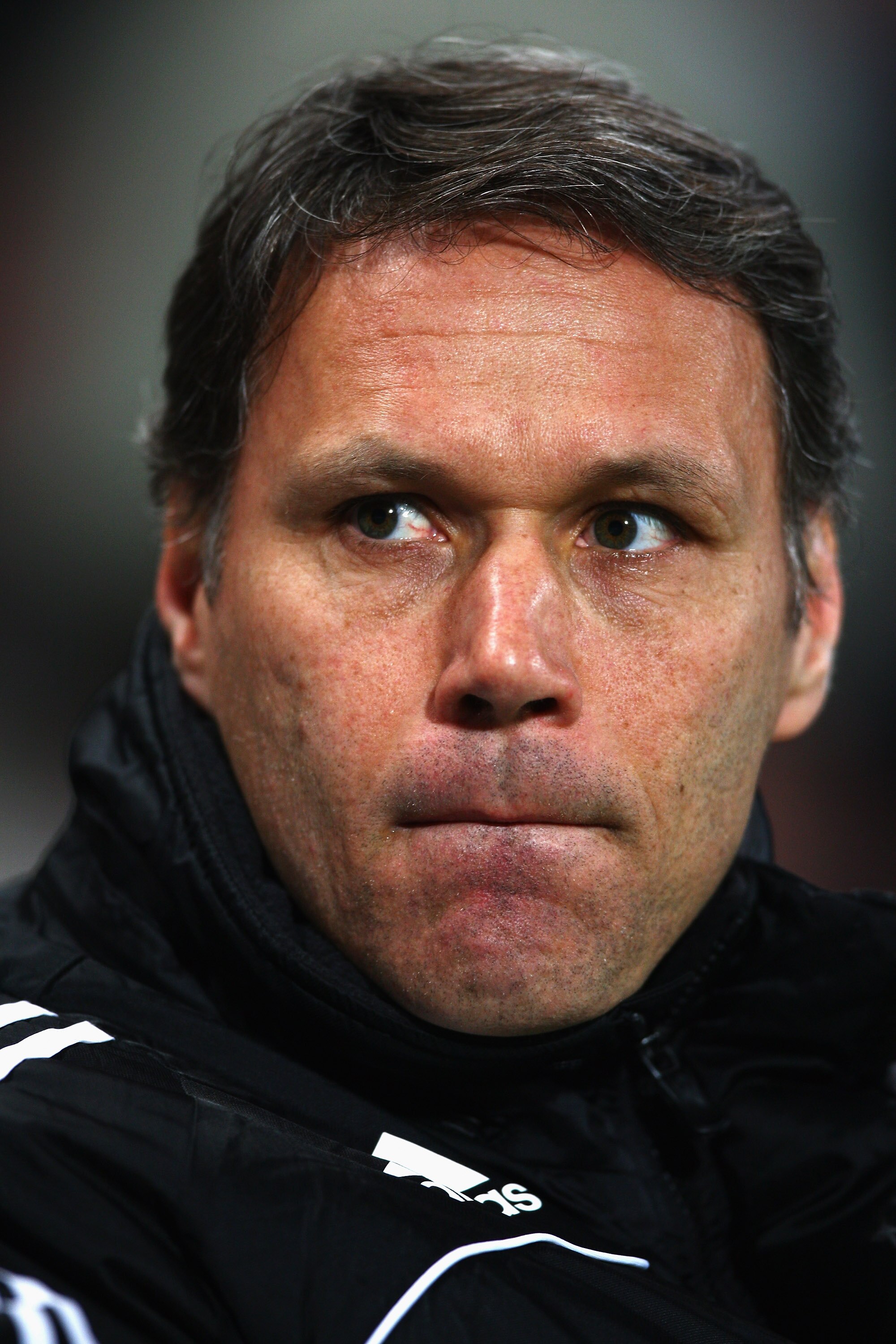 MARSEILLE, FRANCE - MARCH 12:  Marco van Basten, coach of Ajax during the Uefa Cup last sixteen first leg match between Olympique Marseille and Ajax at the Stade Velodrome on March 12, 2009 in Marseille,France.  (Photo by Michael Steele/Getty Images)
