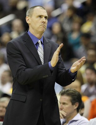 WASHINGTON, DC - FEBRUARY 26:  Rick Carlisle head coach of the Dallas Mavericks applauds his team during a game against the Washington Wizards at the Verizon Center on February 26, 2011 in Washington, DC. NOTE TO USER: User expressly acknowledges and agre