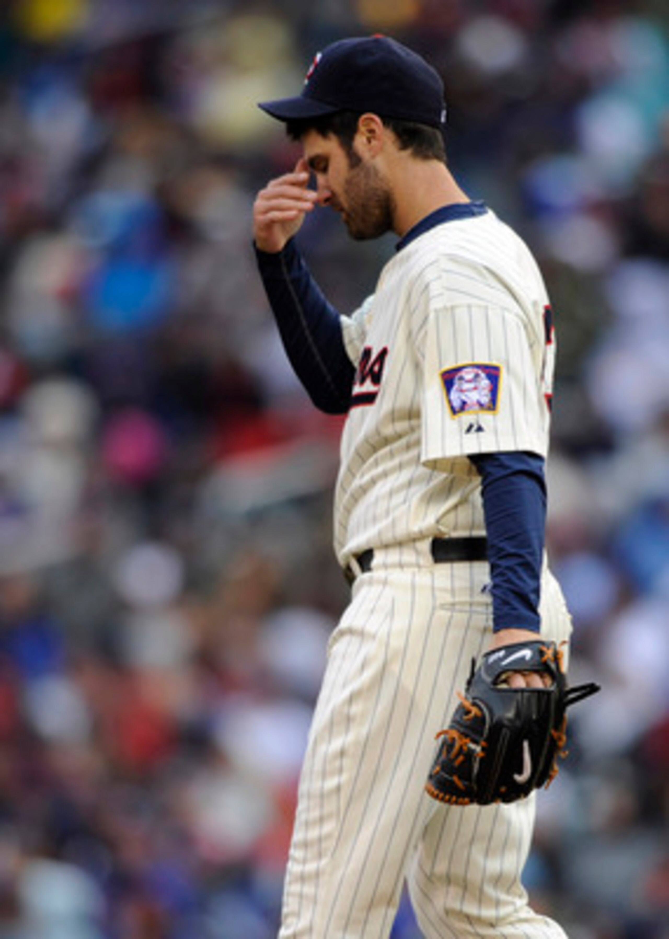 MINNEAPOLIS, MN - MAY 14: Nick Blackburn #53 of the Minnesota Twins reacts to giving up a solo home run to J.P. Arencibia #9 of the Toronto Blue Jays during in the second inning of their game on May 14, 2011 at Target Field in Minneapolis, Minnesota. (Pho