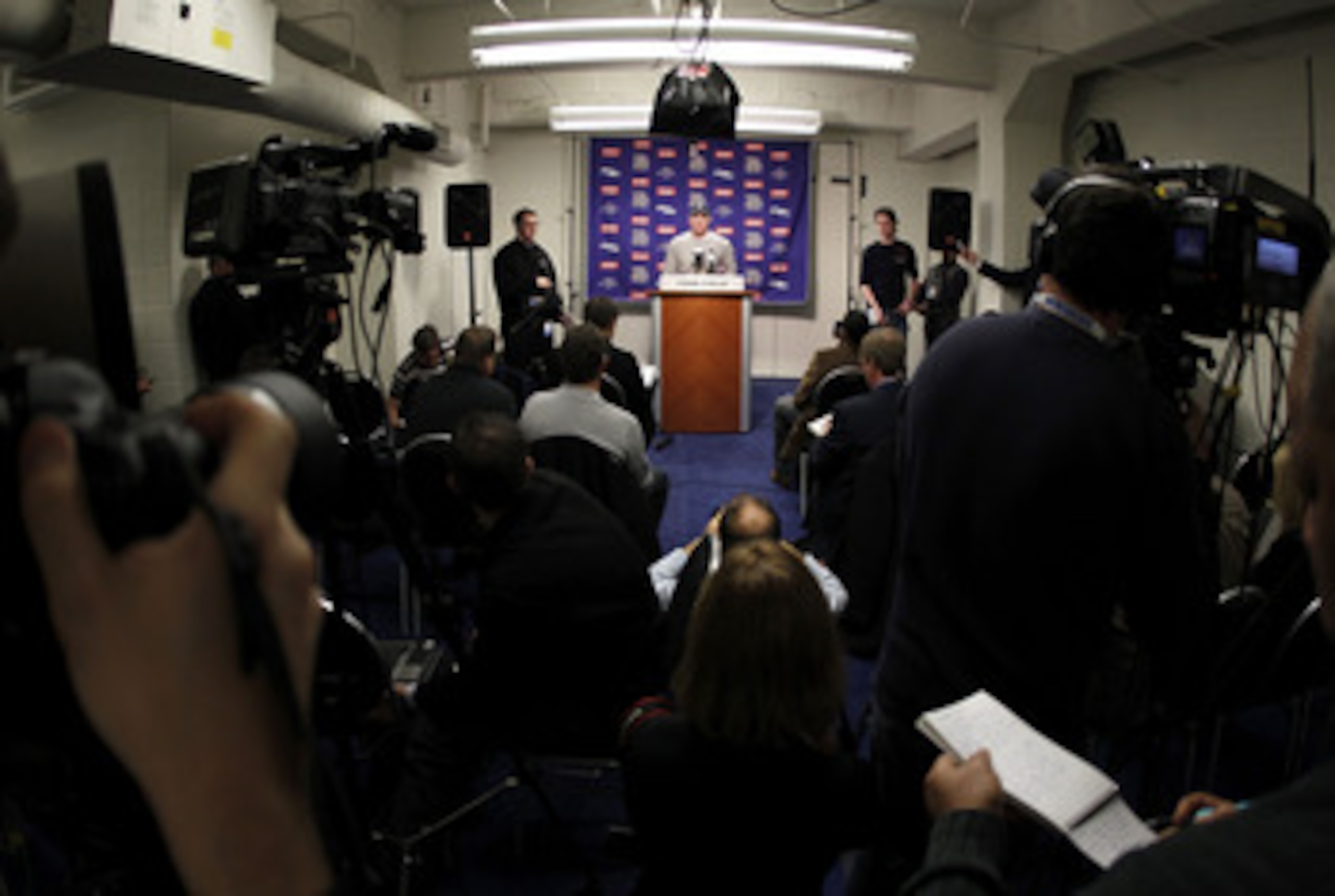 DETROIT, MI - JANUARY 02:  Brett Favre #4 of the Minnesota Vikings talks at a post game press conference after a 13-20 loss to the Detroit Lions at Ford Field on January 2, 2011 in Detroit, Michigan.  (Photo by Gregory Shamus/Getty Images)