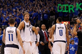 DALLAS, TX - MAY 25:  Dirk Nowitzki #41 of the Dallas Mavericks looks over at teammate Jose Juan Barea #11 late in the fourth quarter while taking on the Oklahoma City Thunder in Game Five of the Western Conference Finals during the 2011 NBA Playoffs at A
