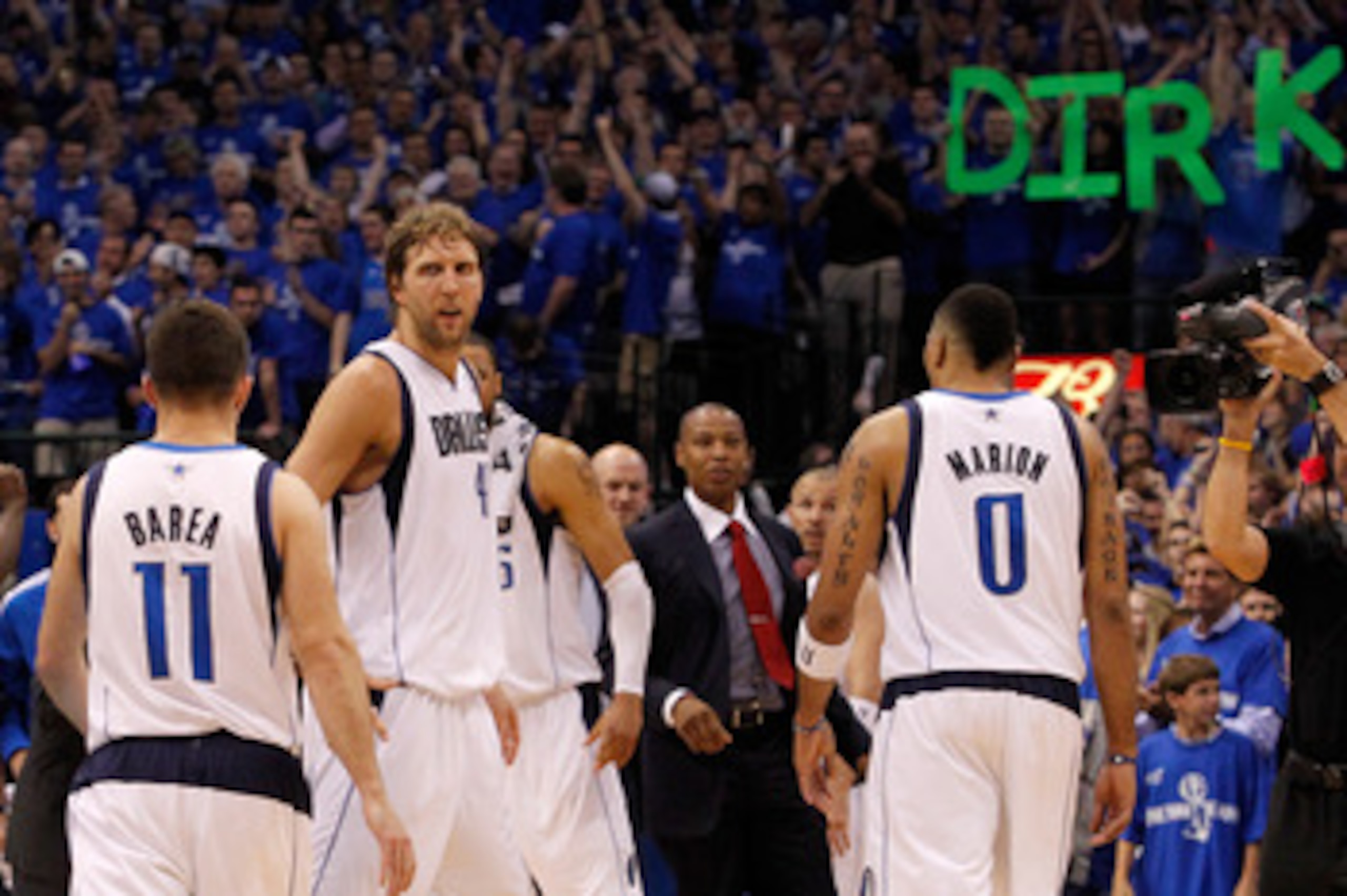 DALLAS, TX - MAY 25: Dirk Nowitzki #41 of the Dallas Mavericks looks over at teammate Jose Juan Barea #11 late in the fourth quarter while taking on the Oklahoma City Thunder in Game Five of the Western Conference Finals during the 2011 NBA Playoffs at A DALLAS, TX - MAY 25: Dirk Nowitzki #41 of the Dallas Mavericks looks over at teammate Jose Juan Barea #11 late in the fourth quarter while taking on the Oklahoma City Thunder in Game Five of the Western Conference Finals during the 2011 NBA Playoffs at A