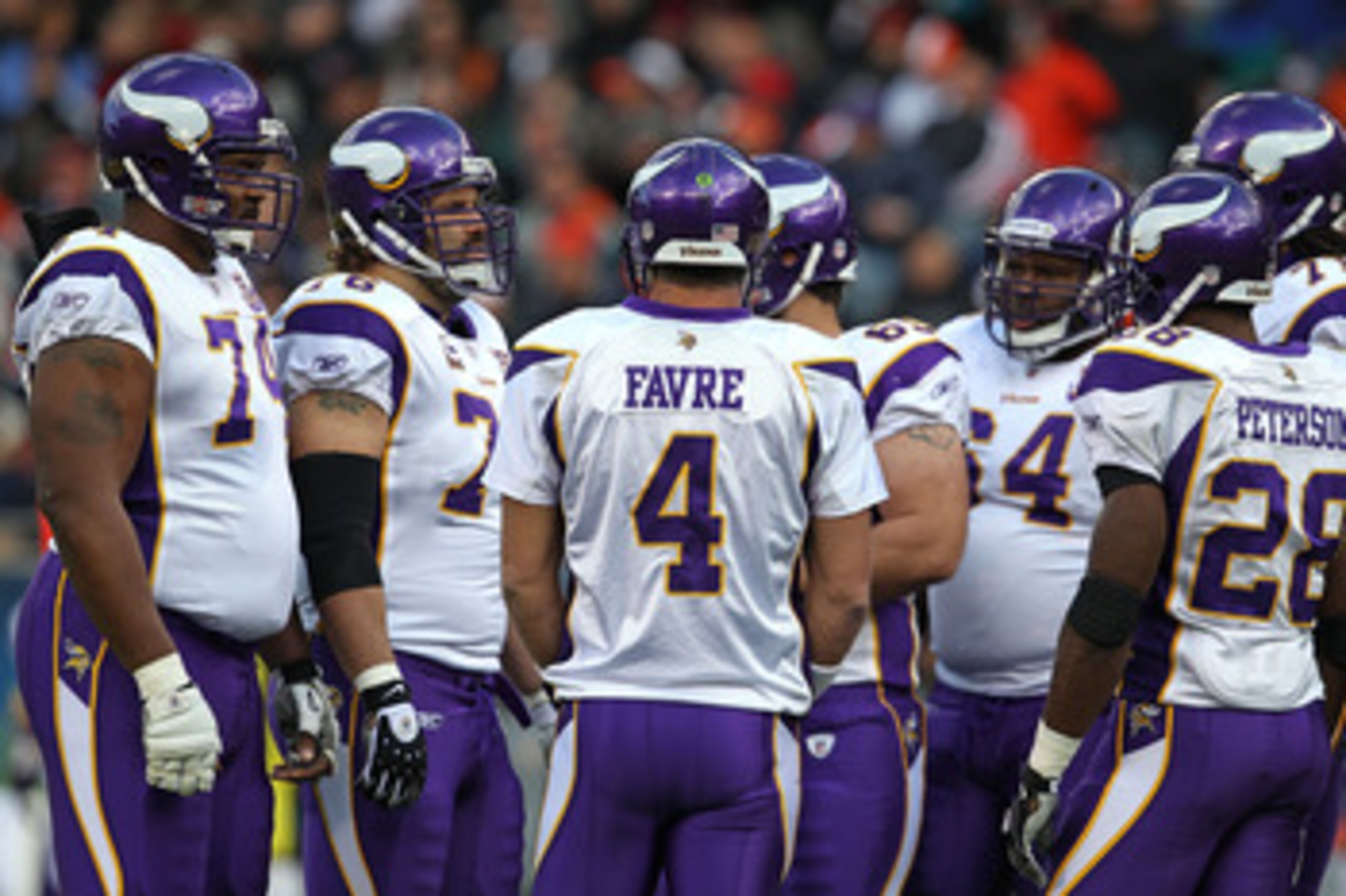 CHICAGO - NOVEMBER 14: Brett Favre #4 of the Minnesota Vikings talks to his offensive teammates in the huddle during a game against the Chicago Bears at Soldier Field on November 14, 2010 in Chicago, Illinois. The Bears defeated the Vikings 27-13. (Photo CHICAGO - NOVEMBER 14: Brett Favre #4 of the Minnesota Vikings talks to his offensive teammates in the huddle during a game against the Chicago Bears at Soldier Field on November 14, 2010 in Chicago, Illinois. The Bears defeated the Vikings 27-13. (Photo