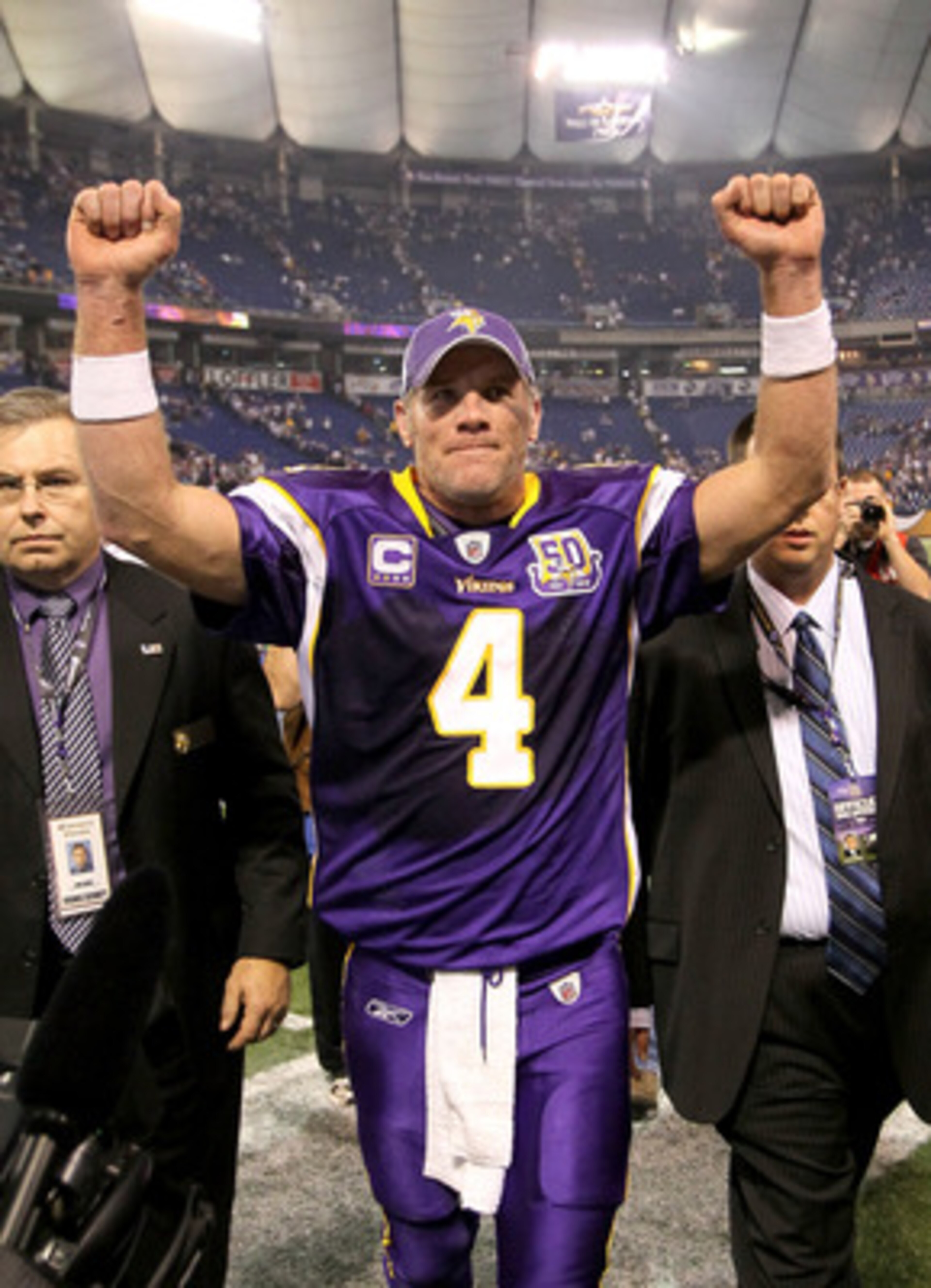 MINNEAPOLIS - NOVEMBER 7: Quarterback Brett Favre #4 of the Minnesota Vikings celebrates as he heaves the field after the game with the Arizona Cardinals at Hubert H. Humphrey Metrodome on November 7, 2010 in Minneapolis, Minnesota. The Vikings won 27-2 MINNEAPOLIS - NOVEMBER 7: Quarterback Brett Favre #4 of the Minnesota Vikings celebrates as he heaves the field after the game with the Arizona Cardinals at Hubert H. Humphrey Metrodome on November 7, 2010 in Minneapolis, Minnesota. The Vikings won 27-2
